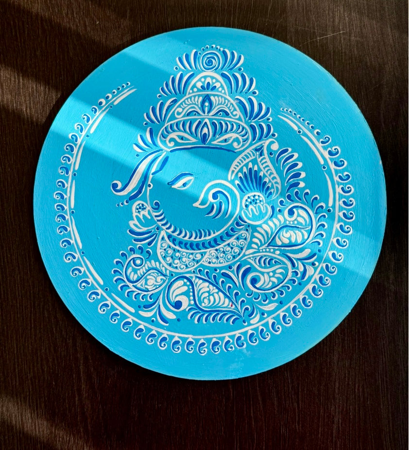 Hand-painted Alpona wall decor plate featuring intricate traditional motifs inspired by Bengali folk art. A stunning blend of cultural heritage and craftsmanship to elevate your home decor.