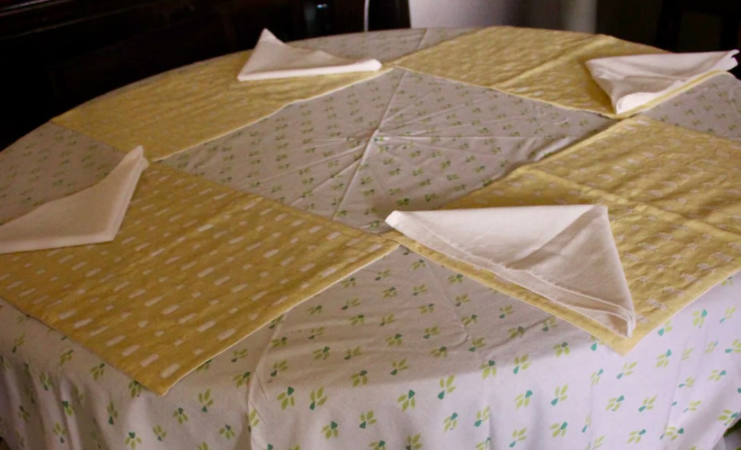Handcrafted Appliqué work on placemats and napkins set, featuring intricate designs and vibrant colors. A beautiful fusion of traditional craftsmanship and modern elegance to enhance your dining experience.