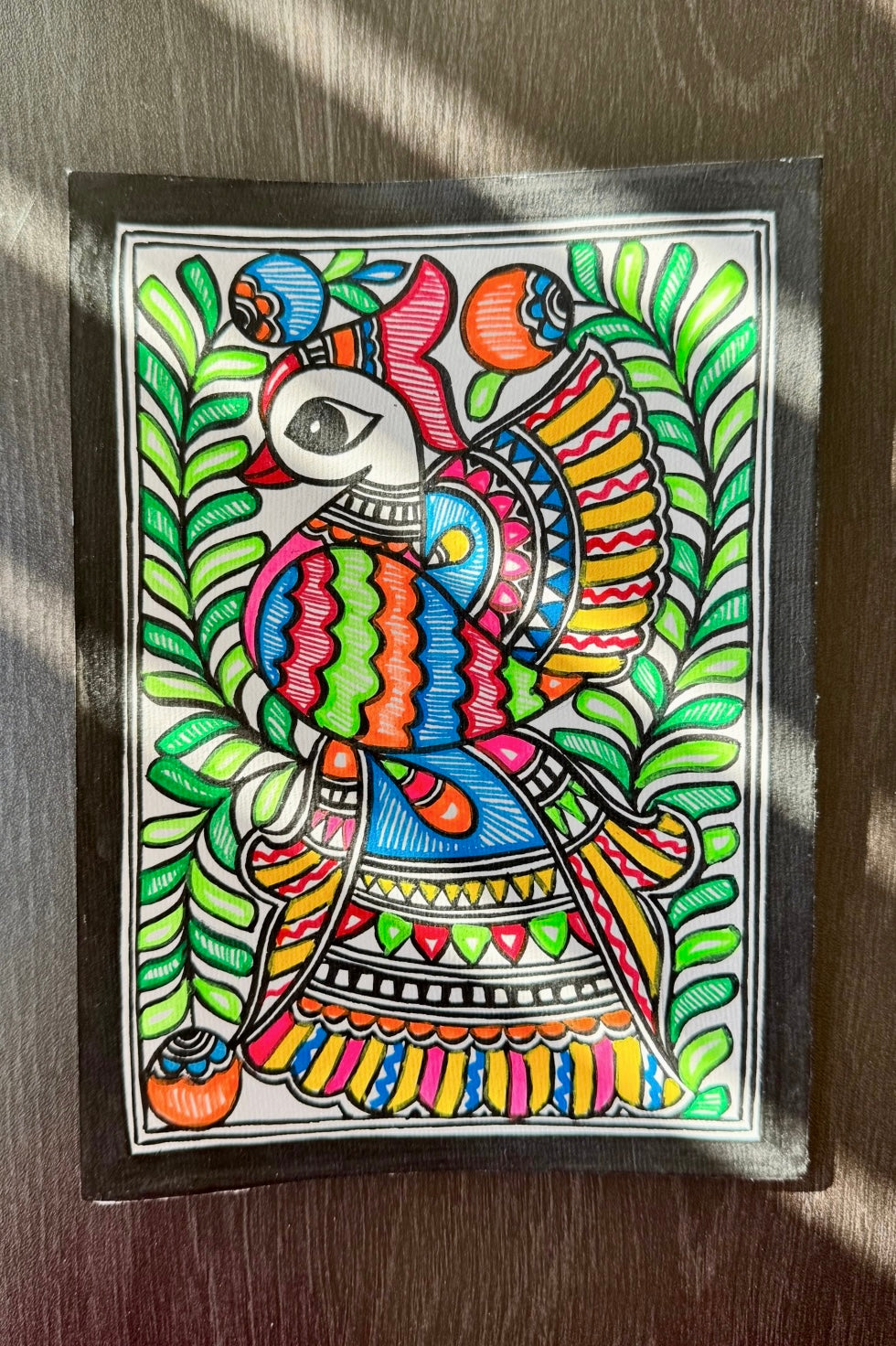 Charming small-sized Madhubani art paintings, featuring intricate hand-painted designs with vibrant colors and traditional motifs. A perfect blend of cultural heritage and artistic beauty to enhance your space.