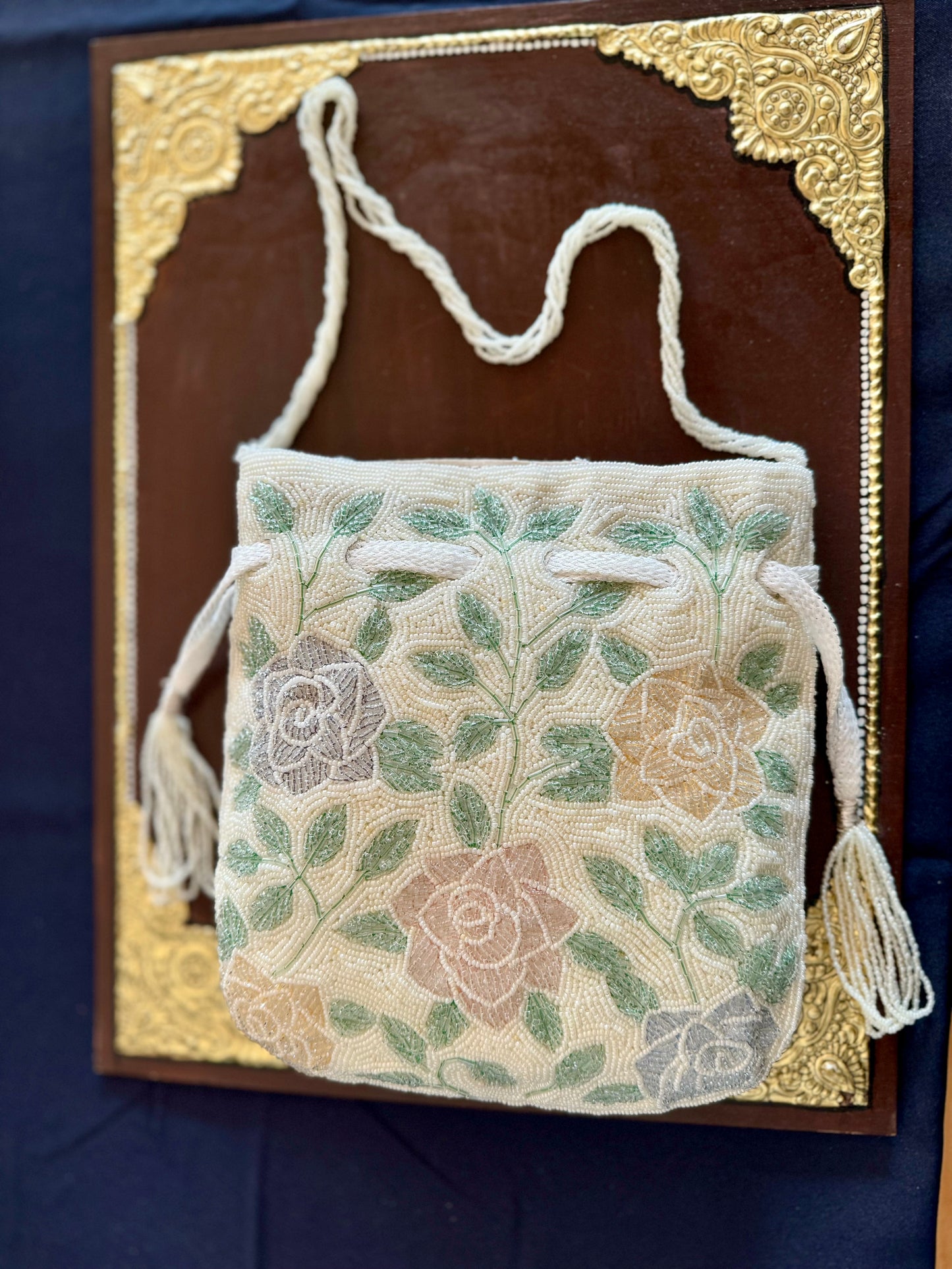 Exquisite beadwork evening clutches and purses, featuring intricate designs and vibrant colors, perfect for adding elegance to any occasion.