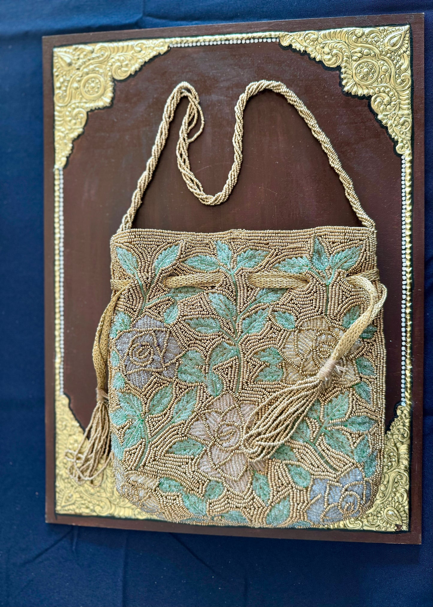 Exquisite beadwork evening clutches and purses, featuring intricate designs and vibrant colors, perfect for adding elegance to any occasion.
