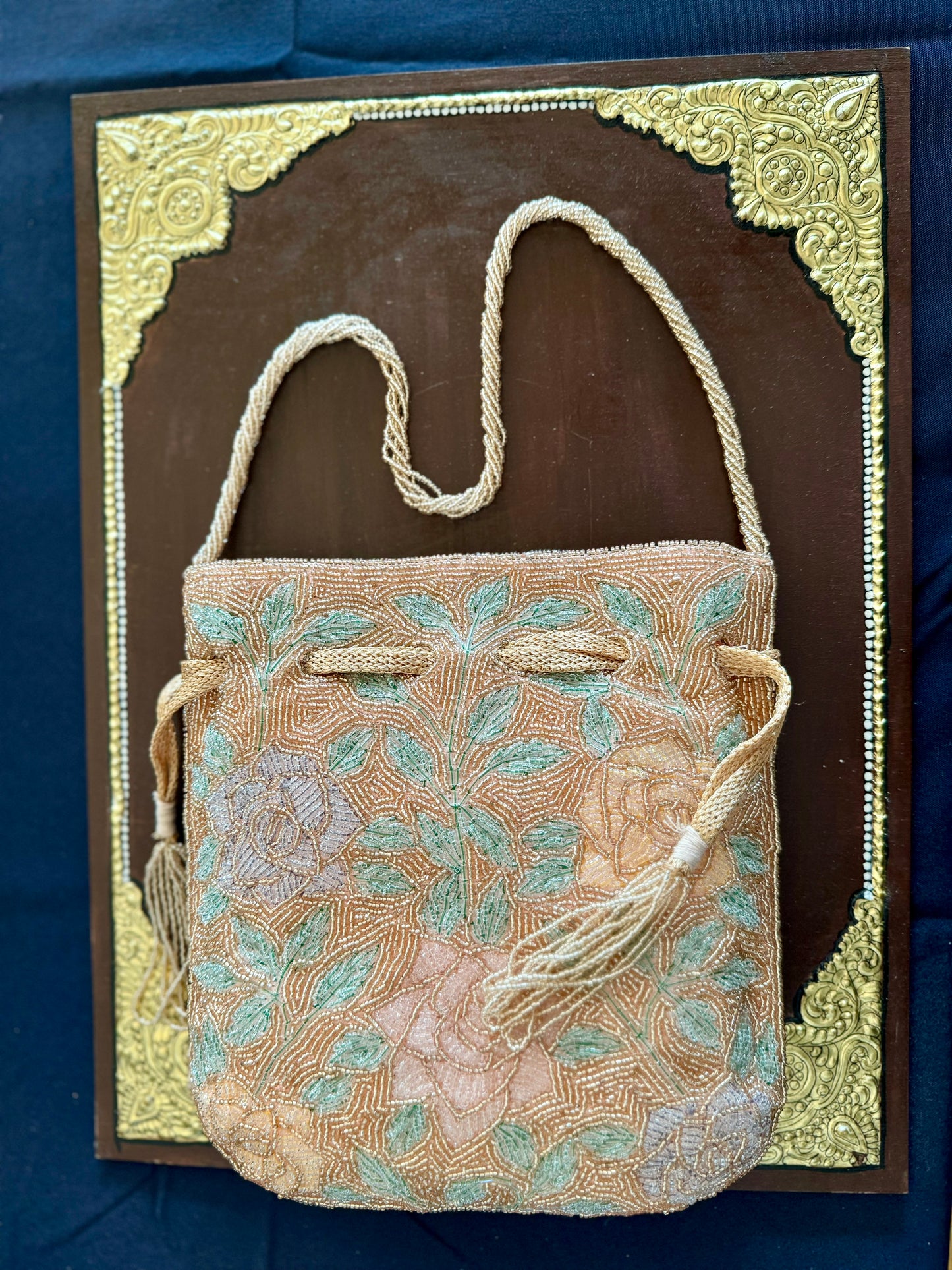 Exquisite beadwork evening clutches and purses, featuring intricate designs and vibrant colors, perfect for adding elegance to any occasion.