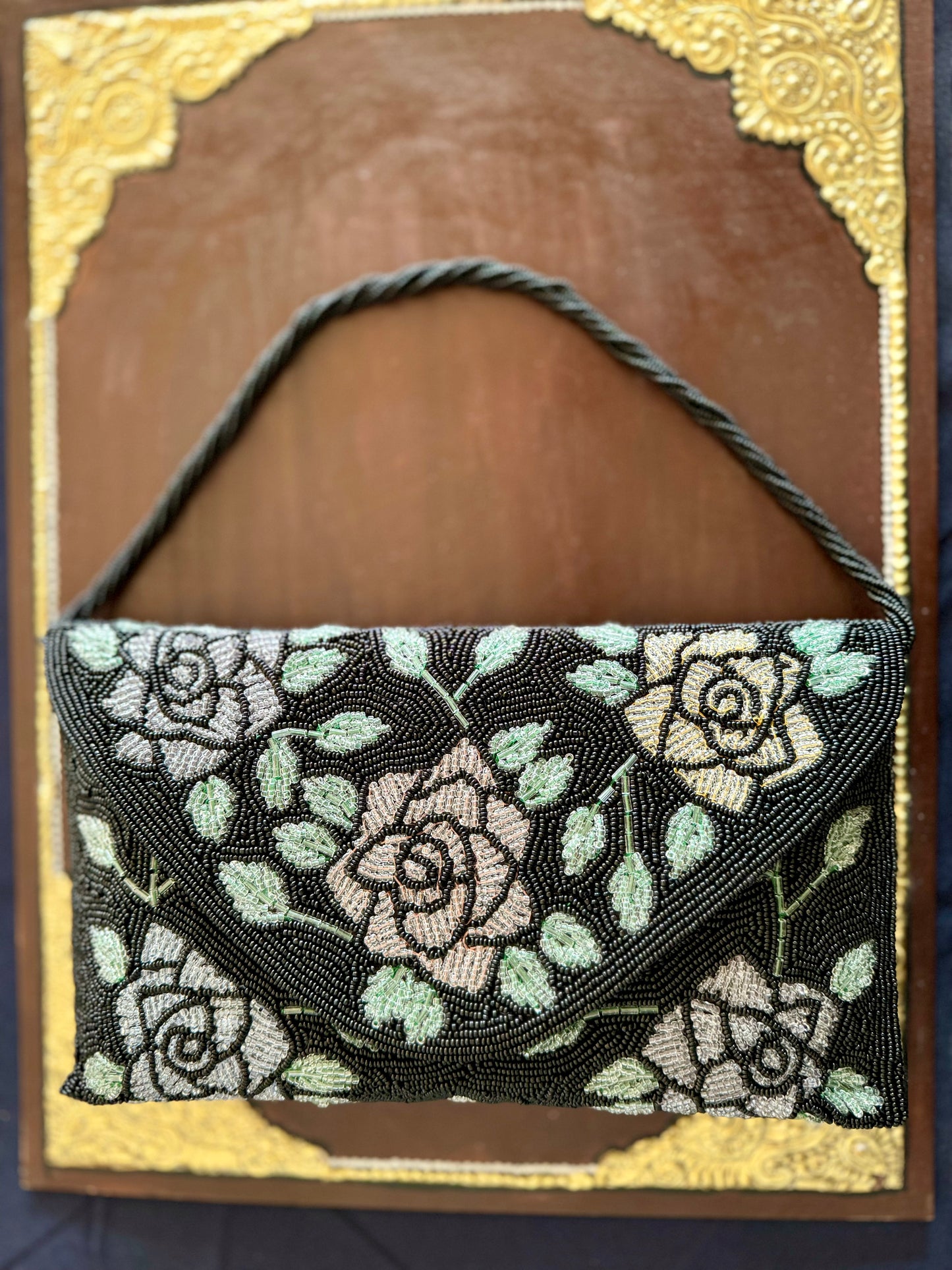 Exquisite beadwork evening clutches and purses, featuring intricate designs and vibrant colors, perfect for adding elegance to any occasion.