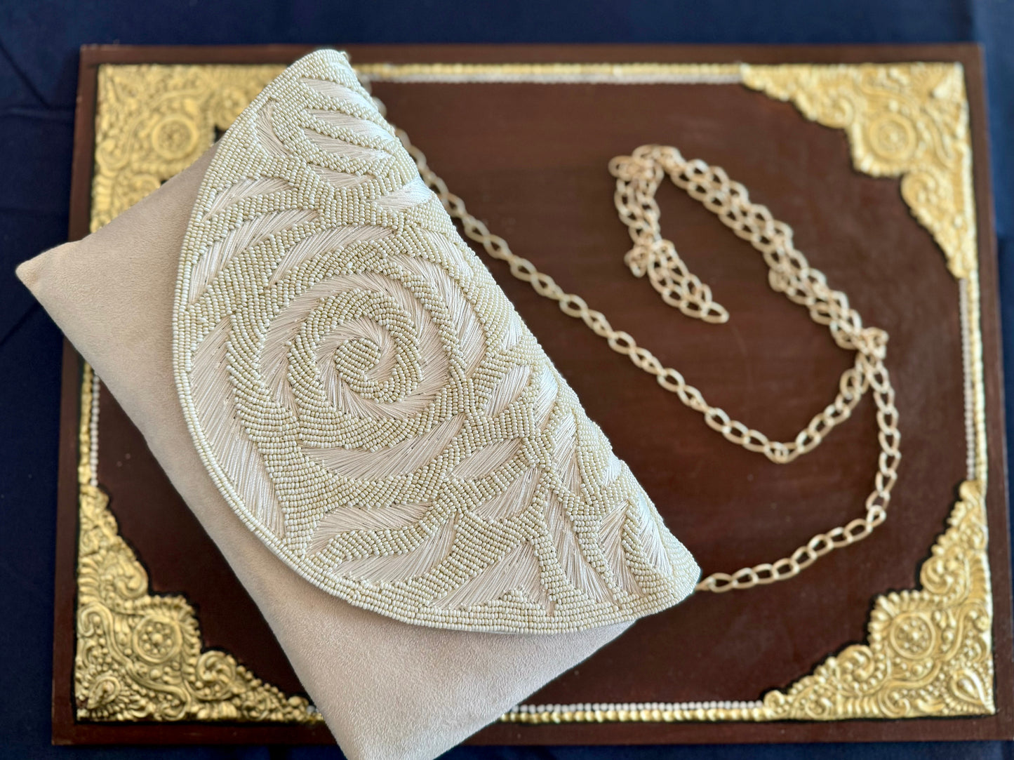 Exquisite beadwork evening clutches and purses, featuring intricate designs and vibrant colors, perfect for adding elegance to any occasion.