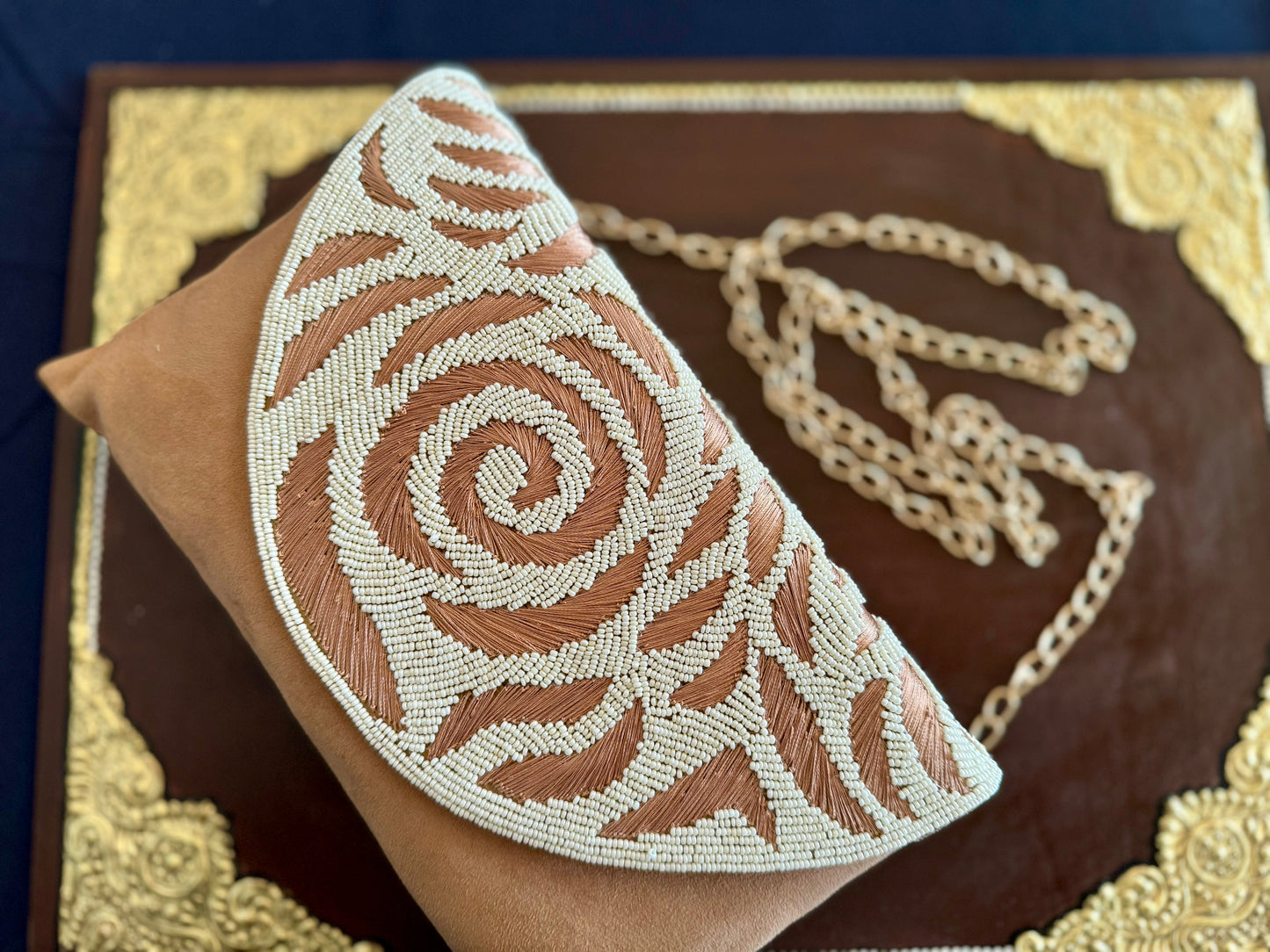 Exquisite beadwork evening clutches and purses, featuring intricate designs and vibrant colors, perfect for adding elegance to any occasion.