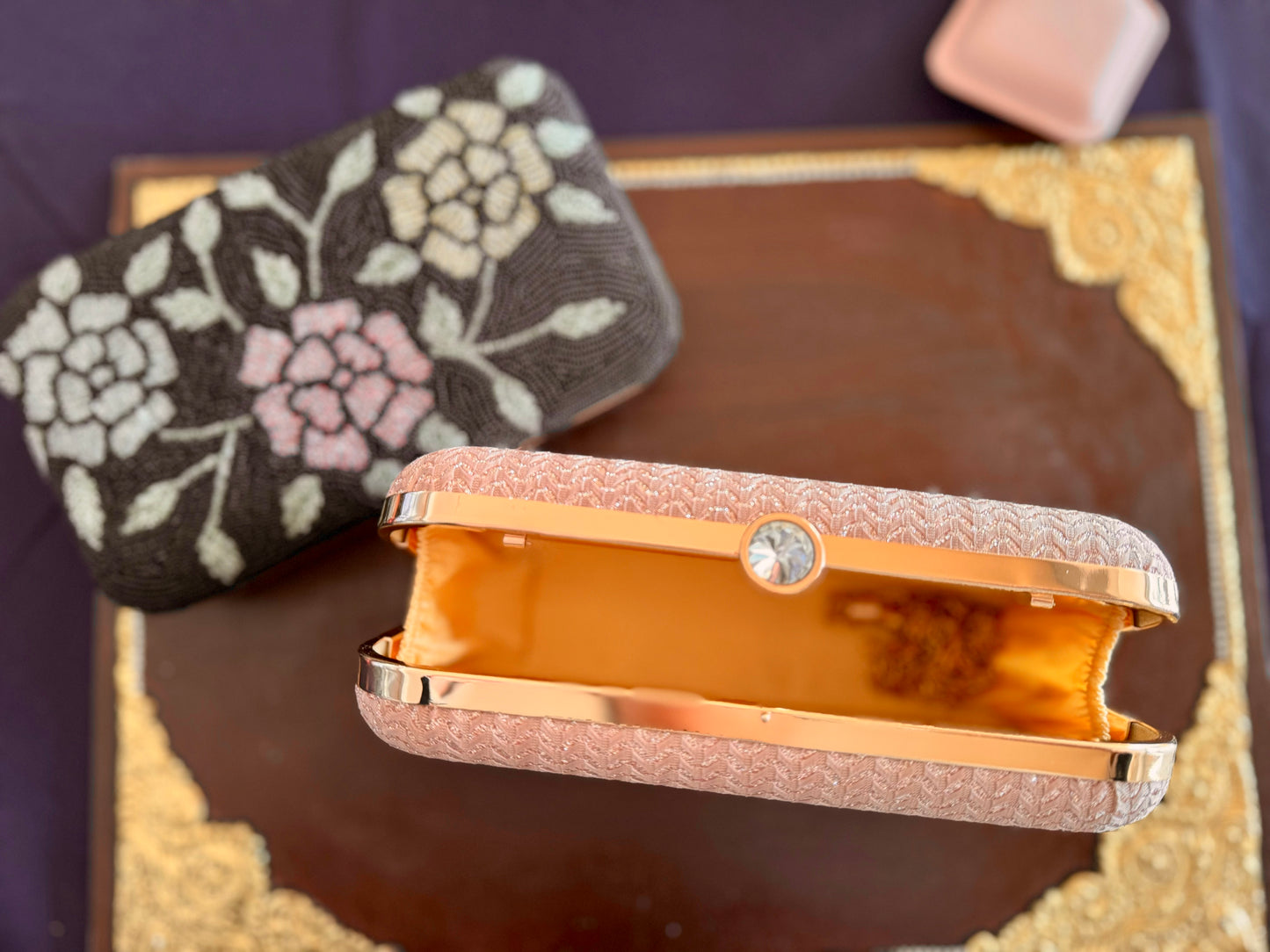 Exquisite beadwork evening clutches and purses, featuring intricate designs and vibrant colors, perfect for adding elegance to any occasion.
