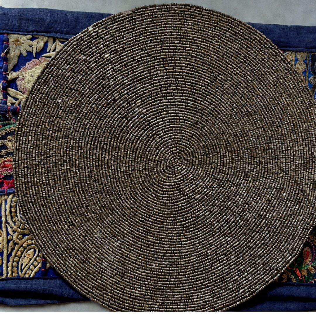 Beaded placemats/chargers, featuring intricate beadwork that adds a touch of elegance and cultural richness to your dining table decor.