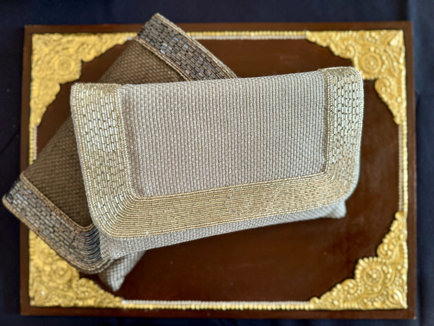 Exquisite beadwork evening clutches and purses, featuring intricate designs and vibrant colors, perfect for adding elegance to any occasion.