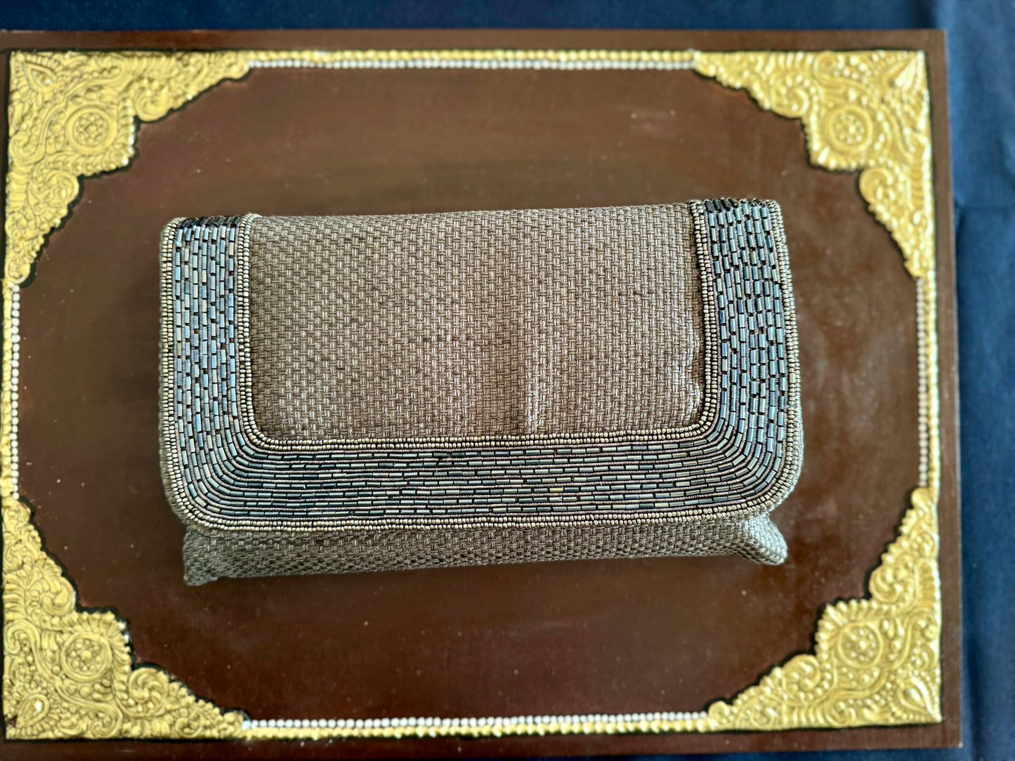 Exquisite beadwork evening clutches and purses, featuring intricate designs and vibrant colors, perfect for adding elegance to any occasion.