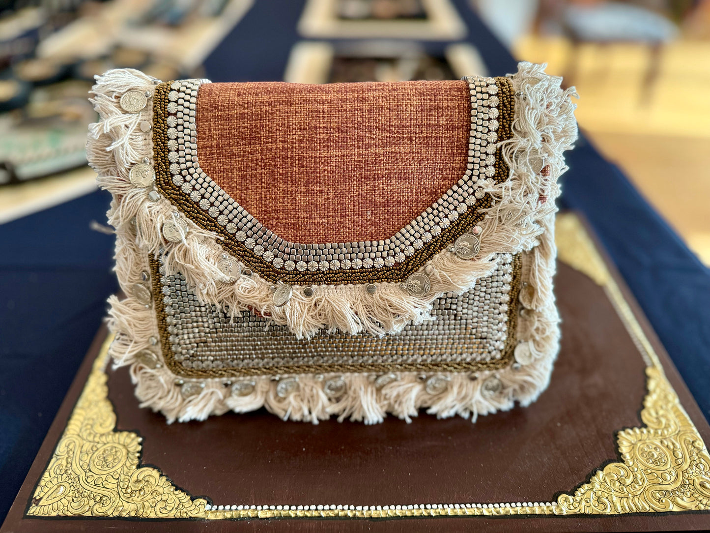 Exquisite beadwork evening clutches and purses, featuring intricate designs and vibrant colors, perfect for adding elegance to any occasion.