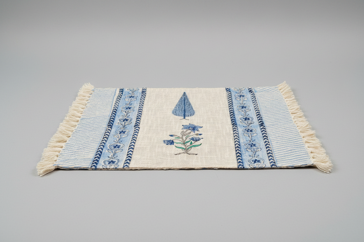 Textile with floral hand block print on a gray background