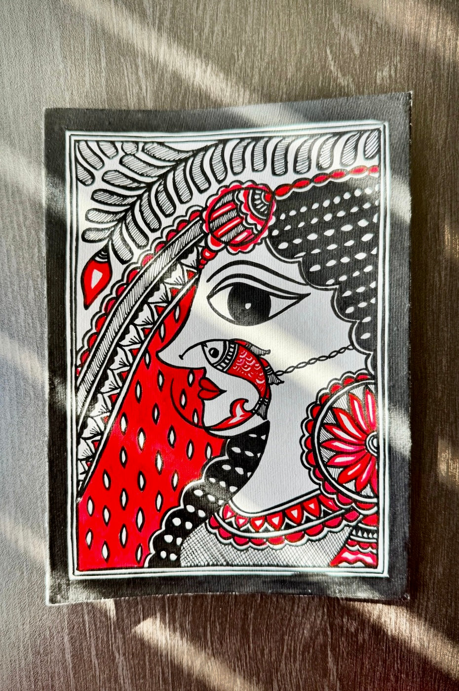 Charming small-sized Madhubani art paintings, featuring intricate hand-painted designs with vibrant colors and traditional motifs. A perfect blend of cultural heritage and artistic beauty to enhance your space.