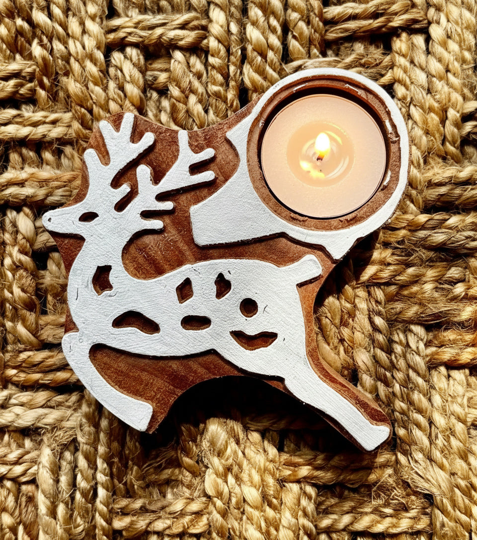 Wooden reindeer-shaped bottle opener on a textured woven surface