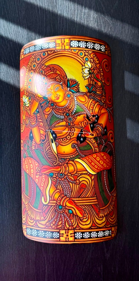 Handcrafted Kerala Mural art on bamboo wall decor, showcasing vibrant traditional motifs inspired by ancient temple murals of Kerala. A unique fusion of eco-friendly craftsmanship and cultural heritage for your space.