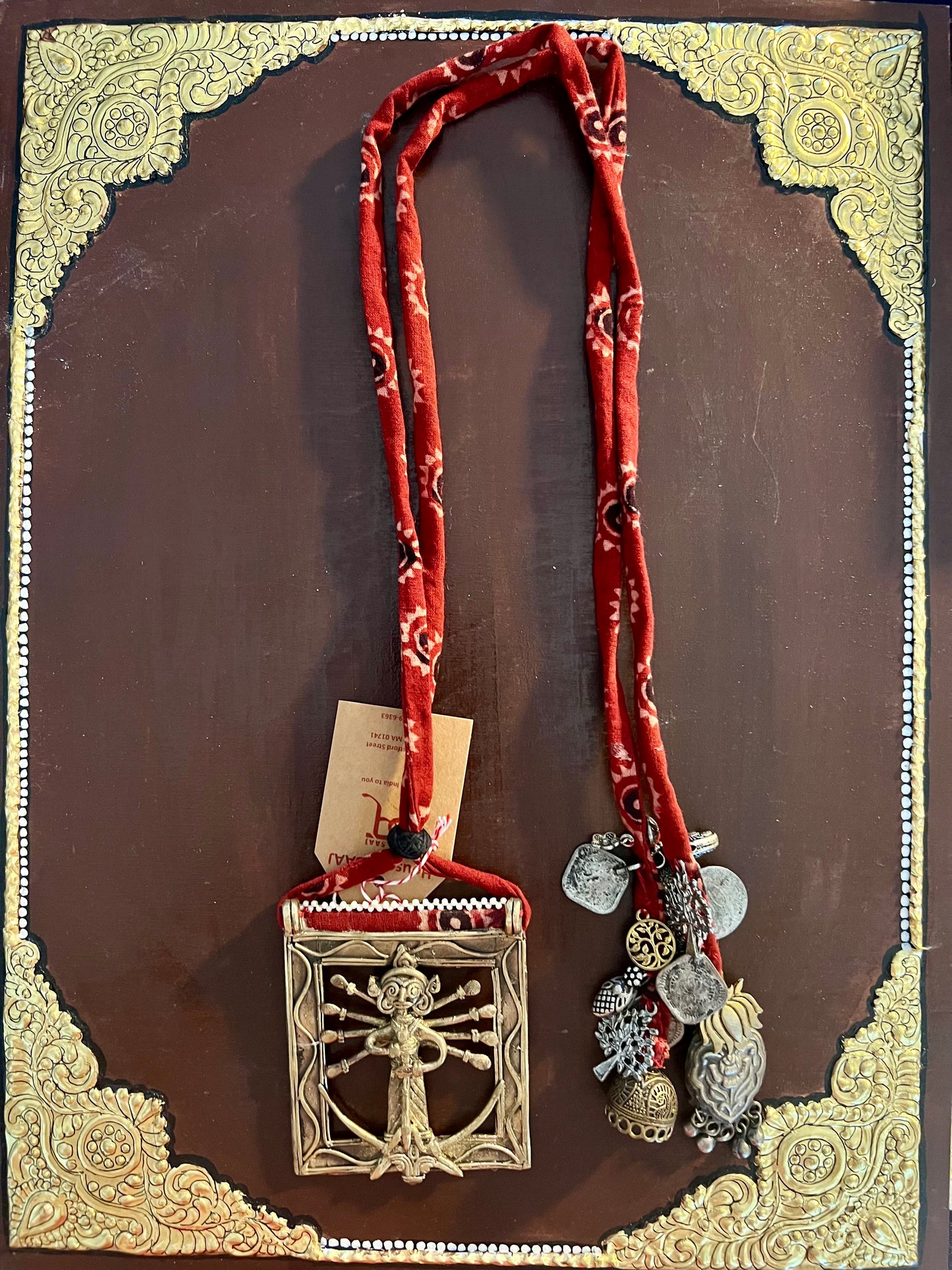 Eco-friendly upcycled handmade Dhokra pendant necklaces, featuring unique tribal metalwork and intricate designs, blending sustainability with traditional artistry.