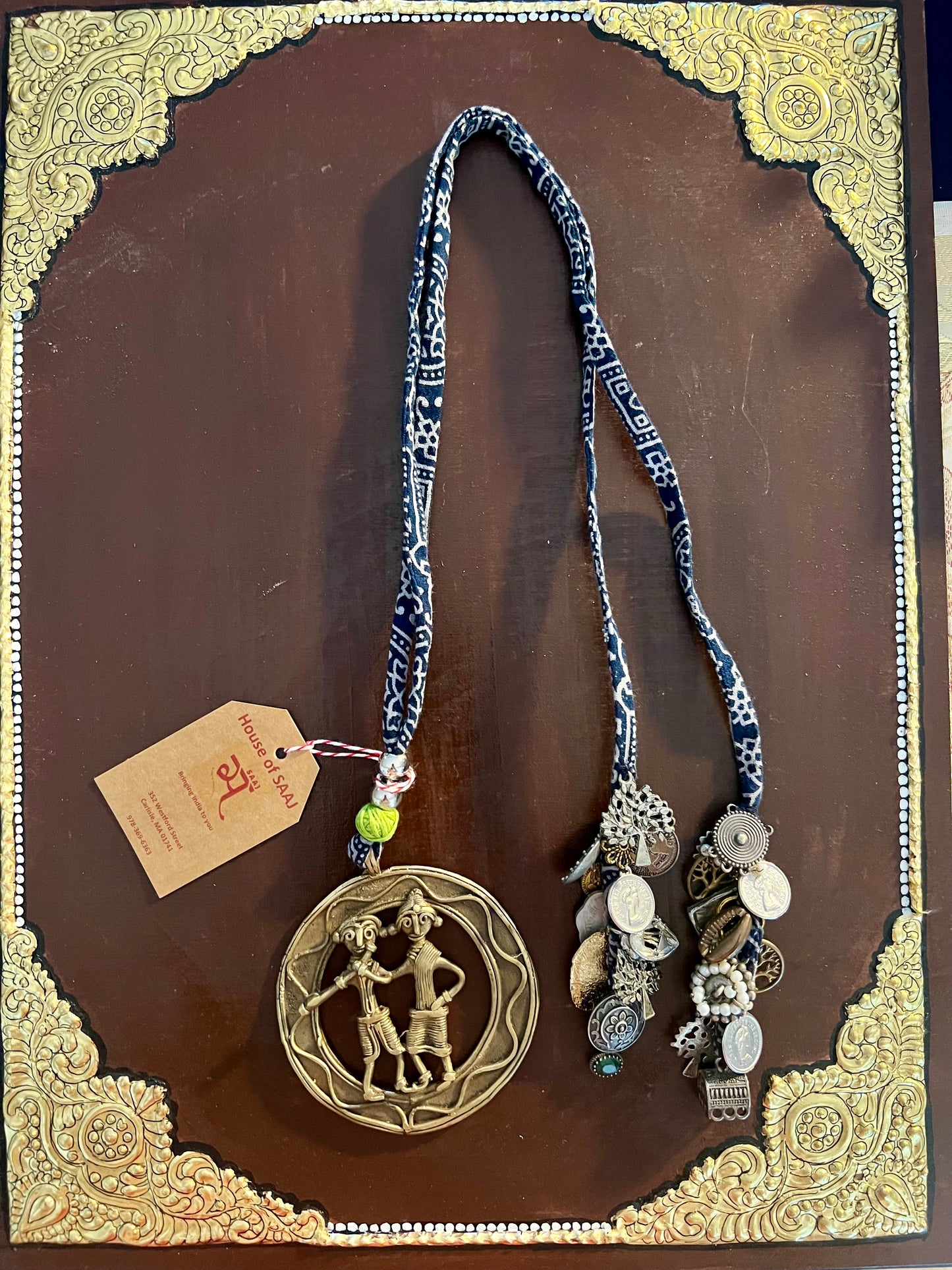 Eco-friendly upcycled handmade Dhokra pendant necklaces, featuring unique tribal metalwork and intricate designs, blending sustainability with traditional artistry.