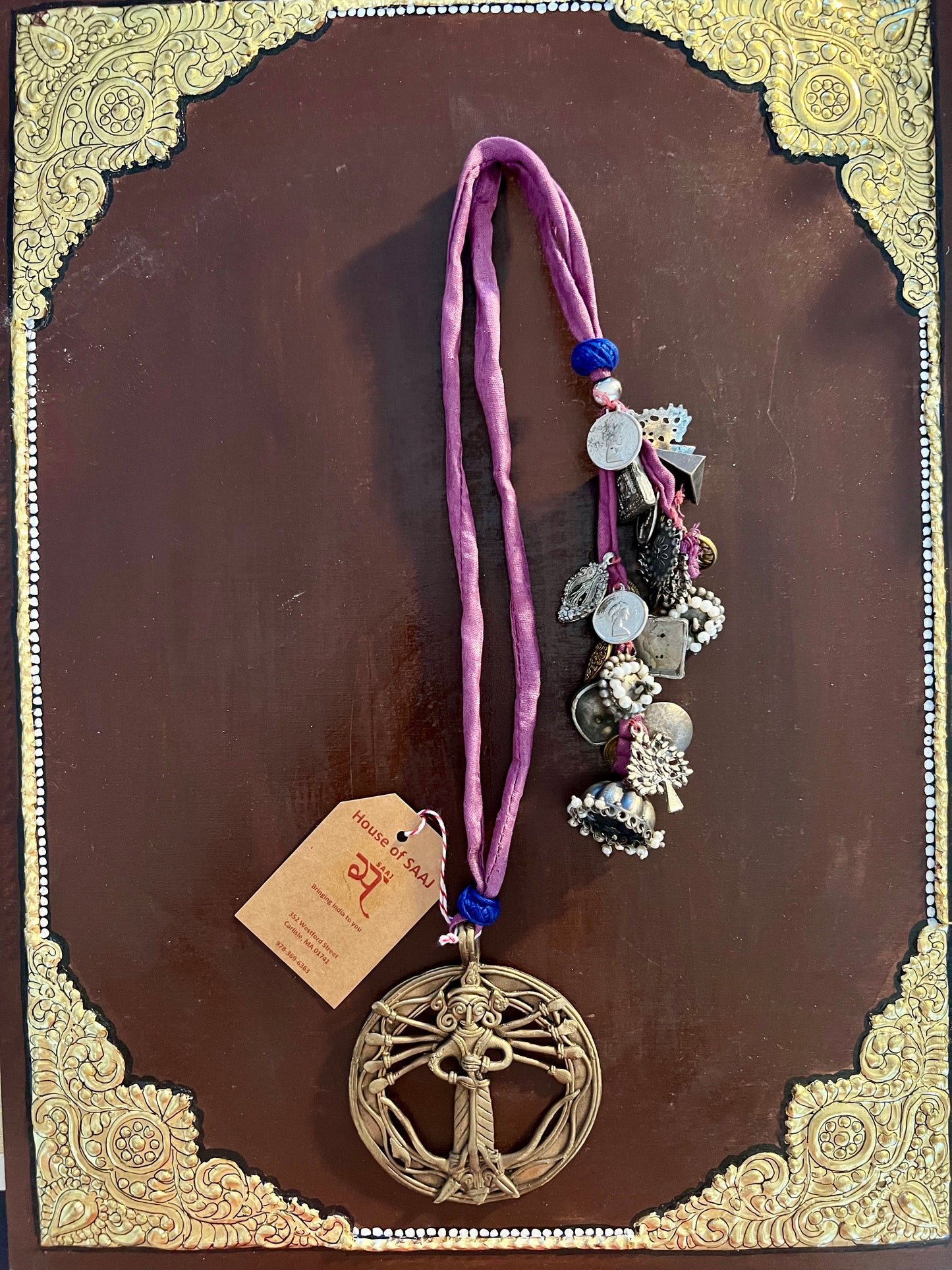 Eco-friendly upcycled handmade Dhokra pendant necklaces, featuring unique tribal metalwork and intricate designs, blending sustainability with traditional artistry.