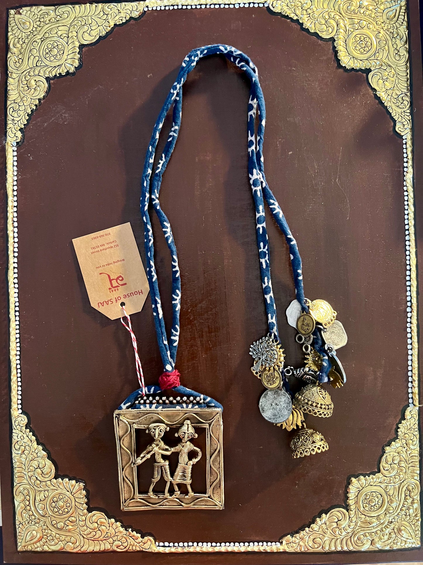 Eco-friendly upcycled handmade Dhokra pendant necklaces, featuring unique tribal metalwork and intricate designs, blending sustainability with traditional artistry.