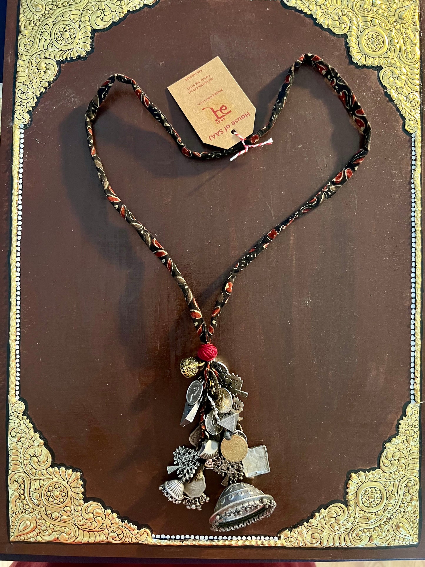 Eco-friendly upcycled handmade medium-sized pendant necklaces, featuring unique designs and sustainable materials, blending style with environmental consciousness.