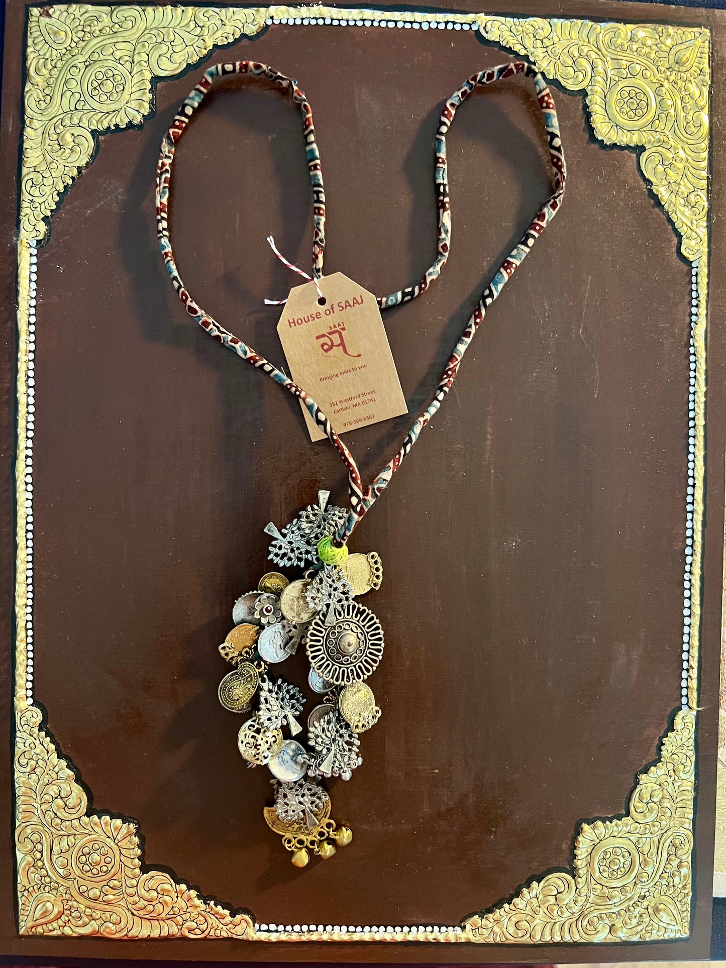 Eco-friendly upcycled handmade medium-sized pendant necklaces, featuring unique designs and sustainable materials, blending style with environmental consciousness.