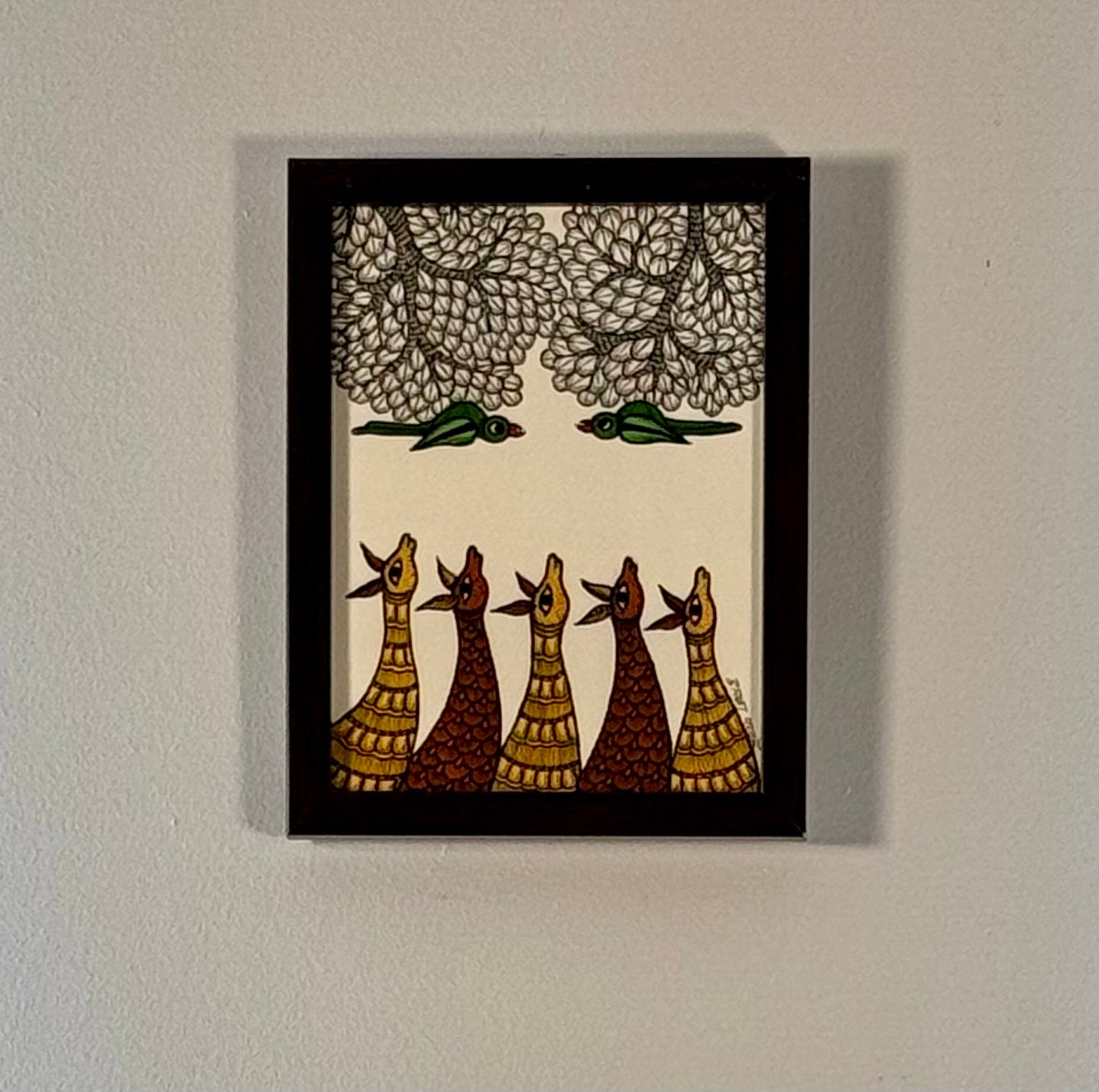 Hand-painted Gond art wall decor featuring intricate tribal patterns and vibrant storytelling inspired by nature and folklore.