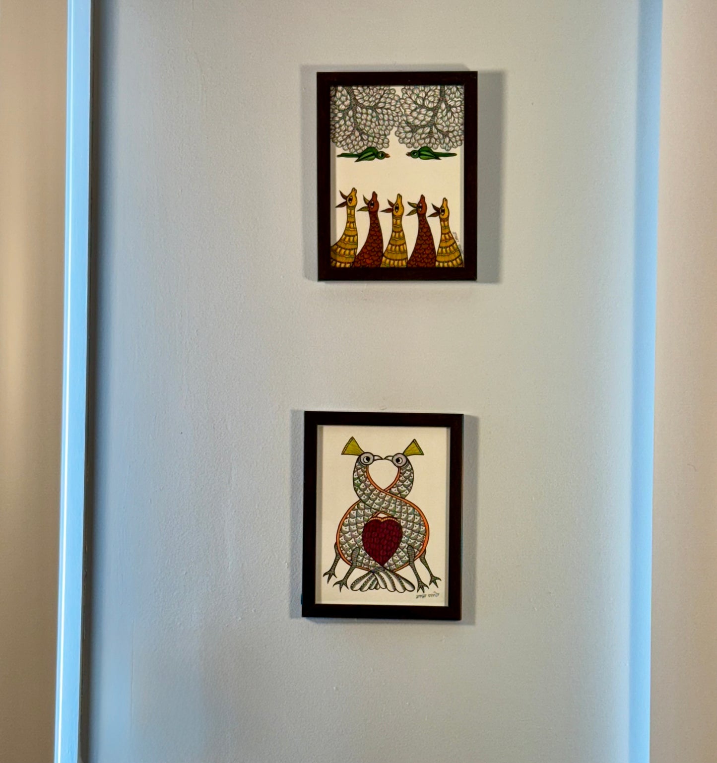 Hand-painted Gond art wall decor featuring intricate tribal patterns and vibrant storytelling inspired by nature and folklore.