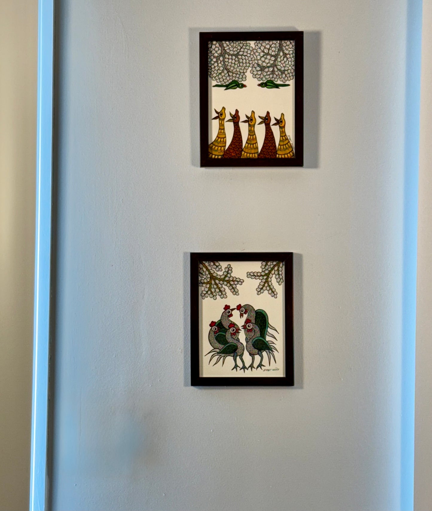 Hand-painted Gond art wall decor featuring intricate tribal patterns and vibrant storytelling inspired by nature and folklore.