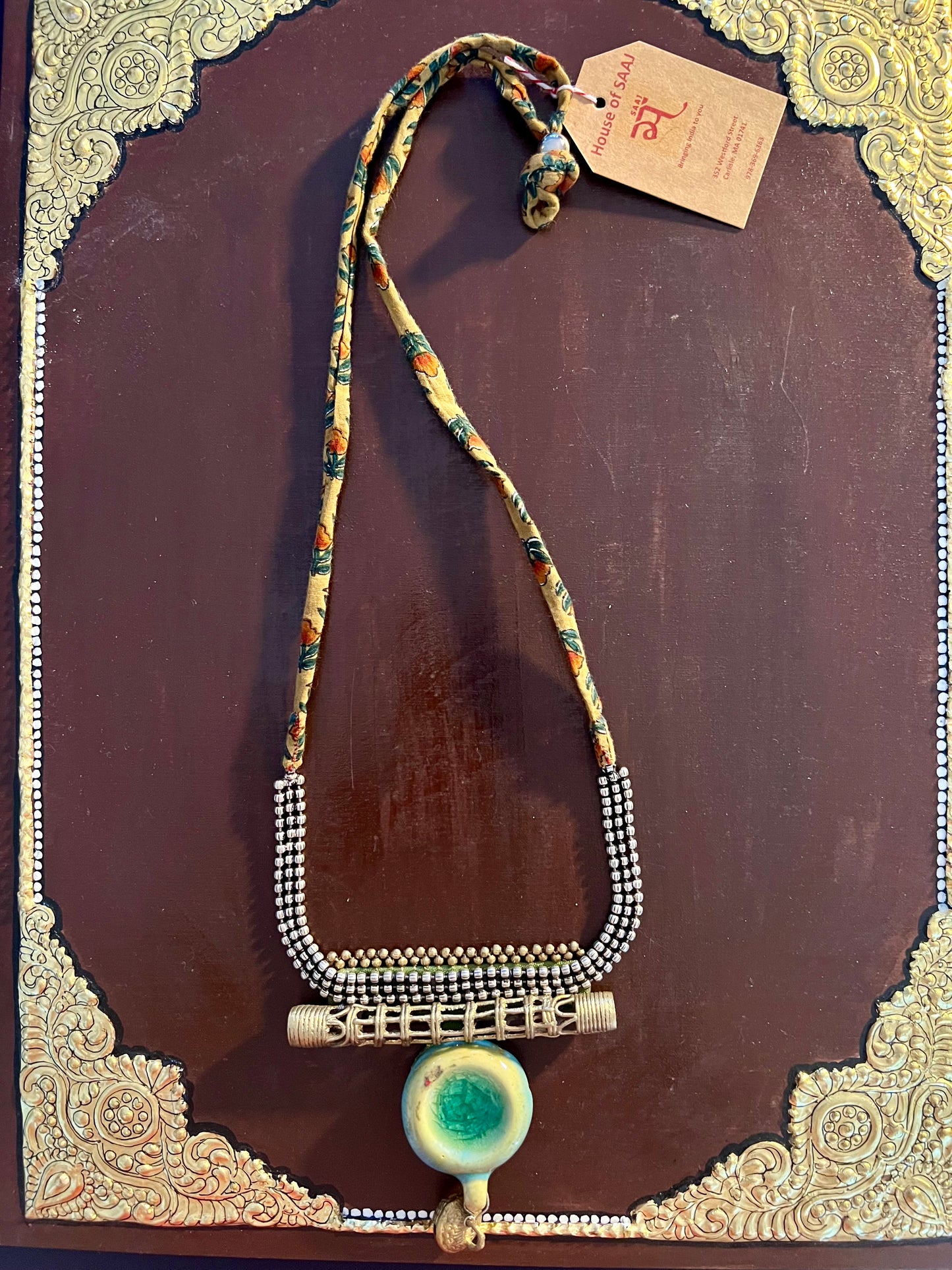 Eco-friendly upcycled handmade medium-sized pendant necklaces, featuring unique designs and sustainable materials, blending style with environmental consciousness.