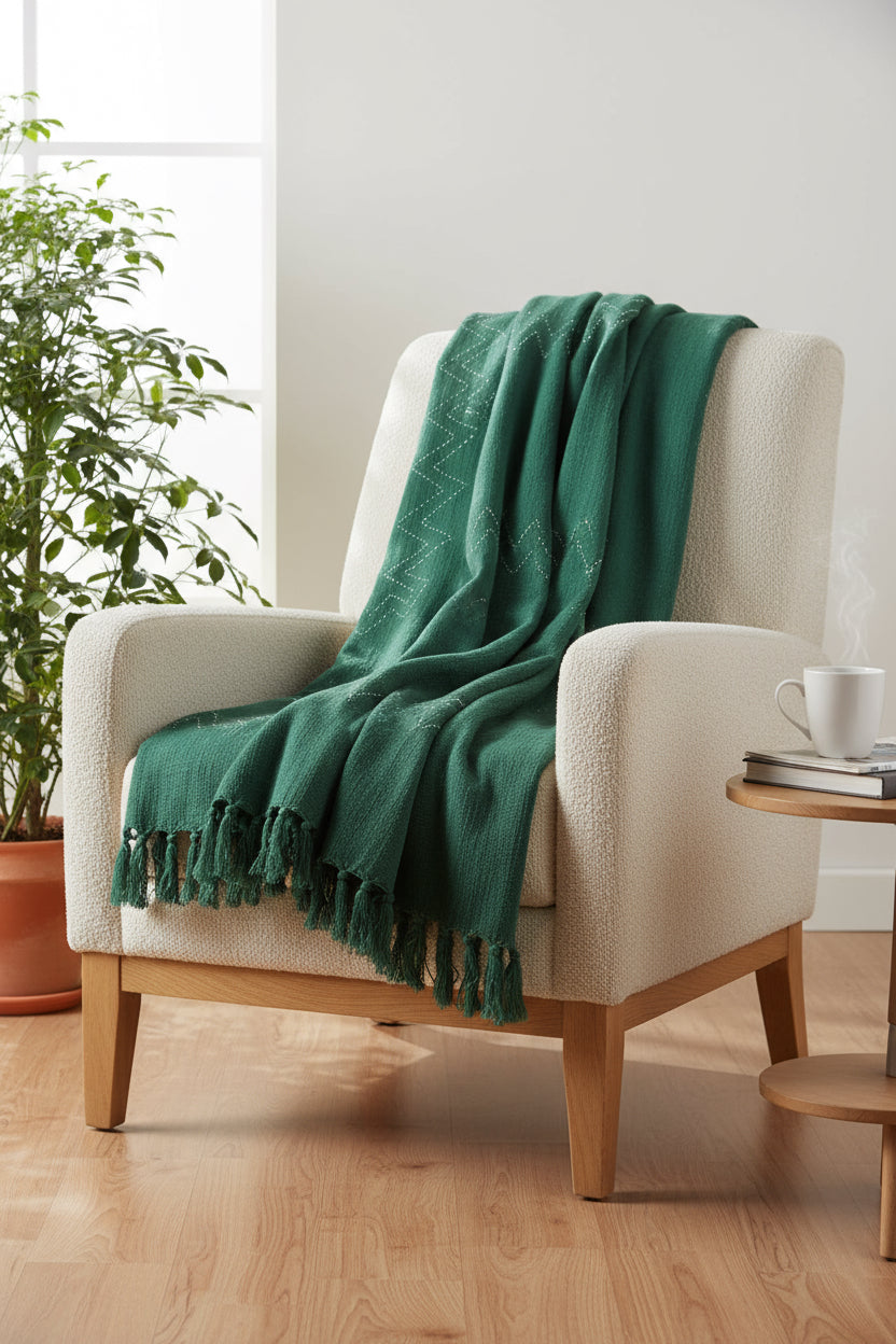Handcrafted Kantha Handloom throw, featuring intricate running stitch embroidery on soft, woven fabric. A beautiful blend of tradition and comfort, perfect for adding warmth and cultural charm to your space.