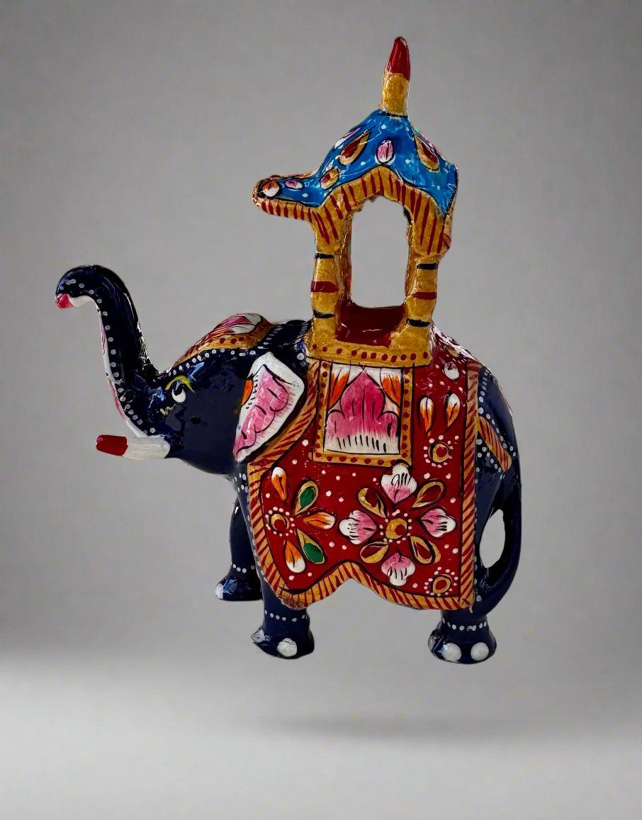 Colorful elephant figurine with a price tag in an indoor setting