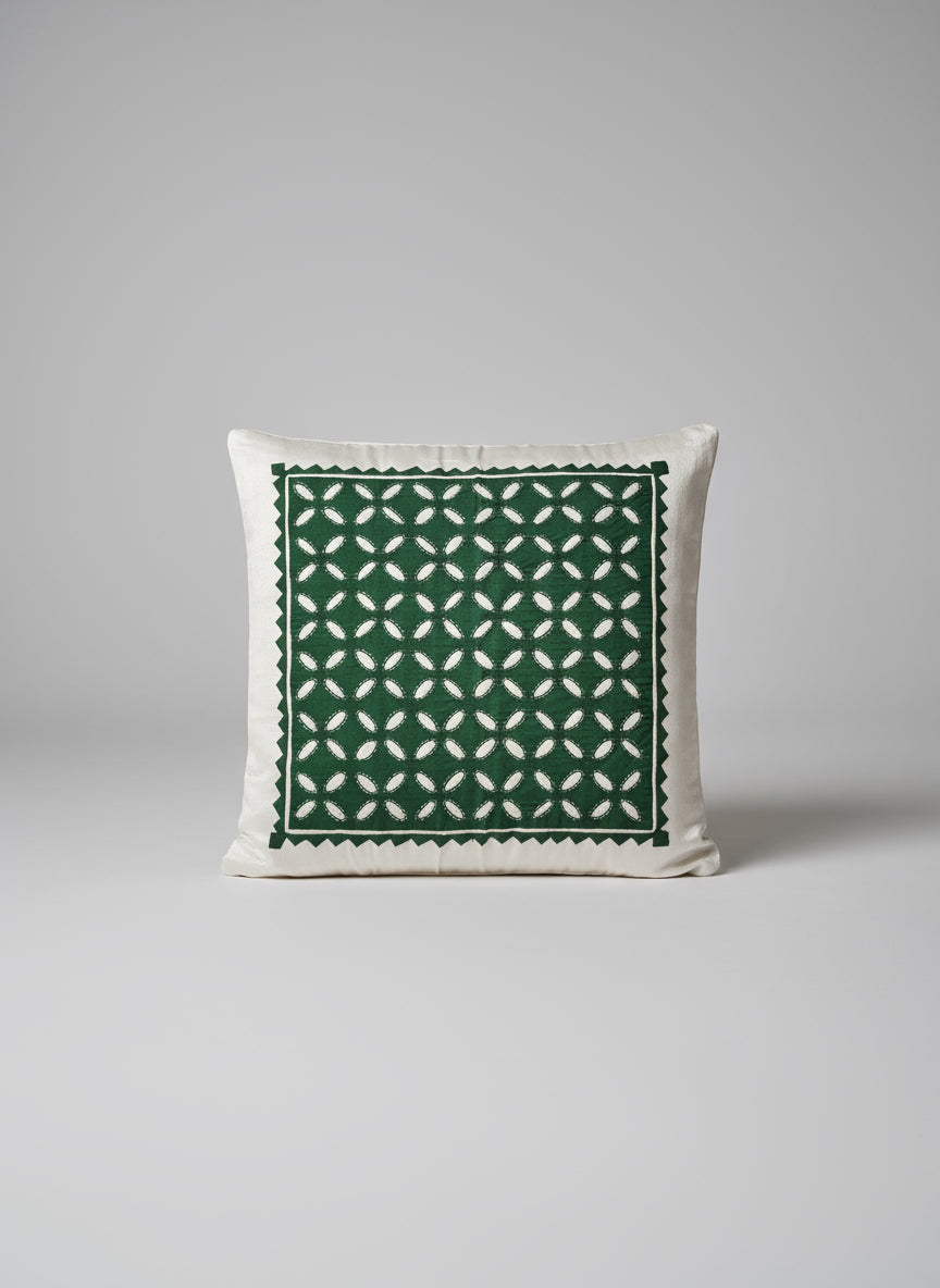 Appliqué work on cushion covers, showcasing vibrant designs and intricate stitching. A beautiful fusion of traditional craftsmanship and modern style, adding a unique touch to your living space.