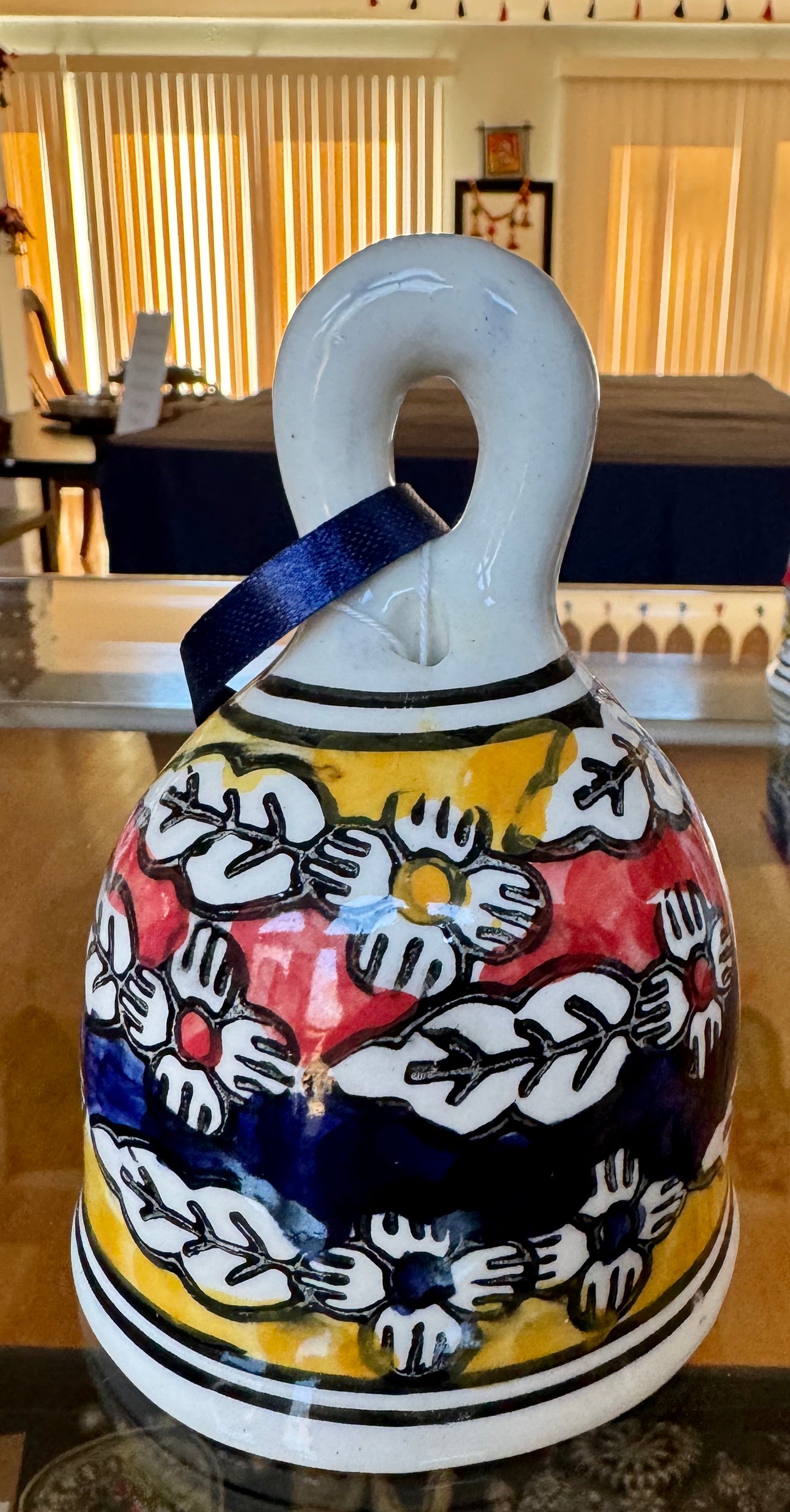 Handcrafted Jaipur Blue Pottery bells, featuring intricate designs and vibrant colors, perfect for adding a festive, traditional Indian touch to your Christmas and holiday decor.