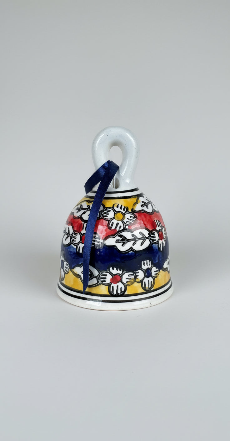 Handcrafted Jaipur Blue Pottery bells, featuring intricate designs and vibrant colors, perfect for adding a festive, traditional Indian touch to your Christmas and holiday decor.