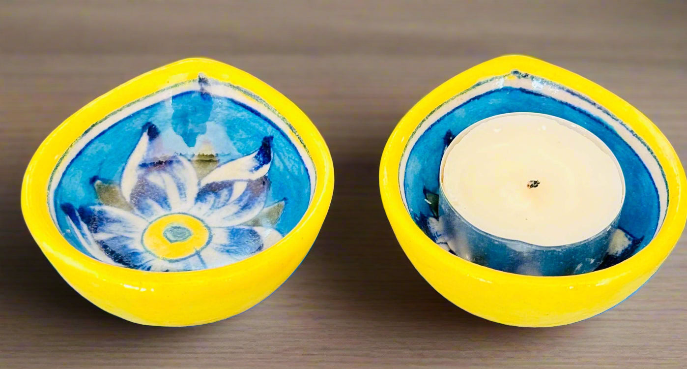 Handcrafted Jaipur Blue Pottery diyas, featuring intricate patterns and vibrant blue tones, perfect for adding a traditional Indian touch to your festive celebrations.