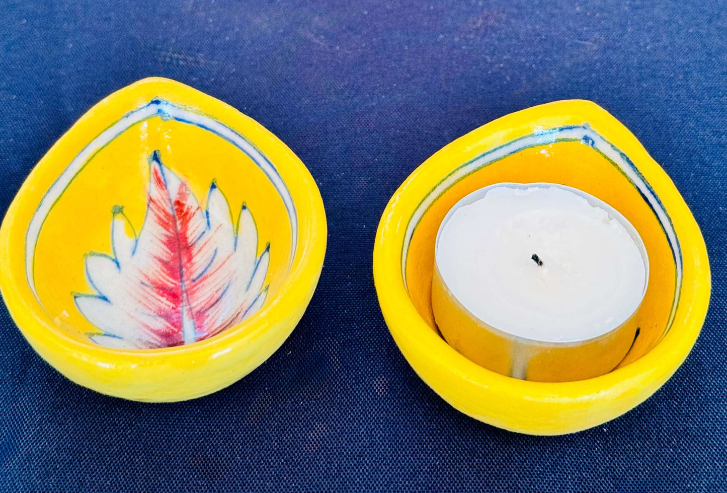 Handcrafted Jaipur Blue Pottery diyas, featuring intricate patterns and vibrant blue tones, perfect for adding a traditional Indian touch to your festive celebrations.