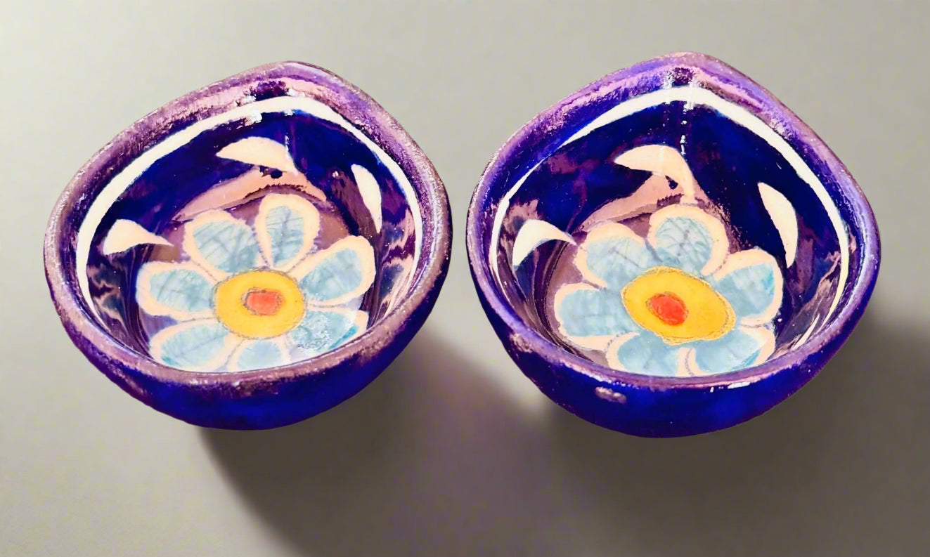 Handcrafted Jaipur Blue Pottery diyas, featuring intricate patterns and vibrant blue tones, perfect for adding a traditional Indian touch to your festive celebrations.