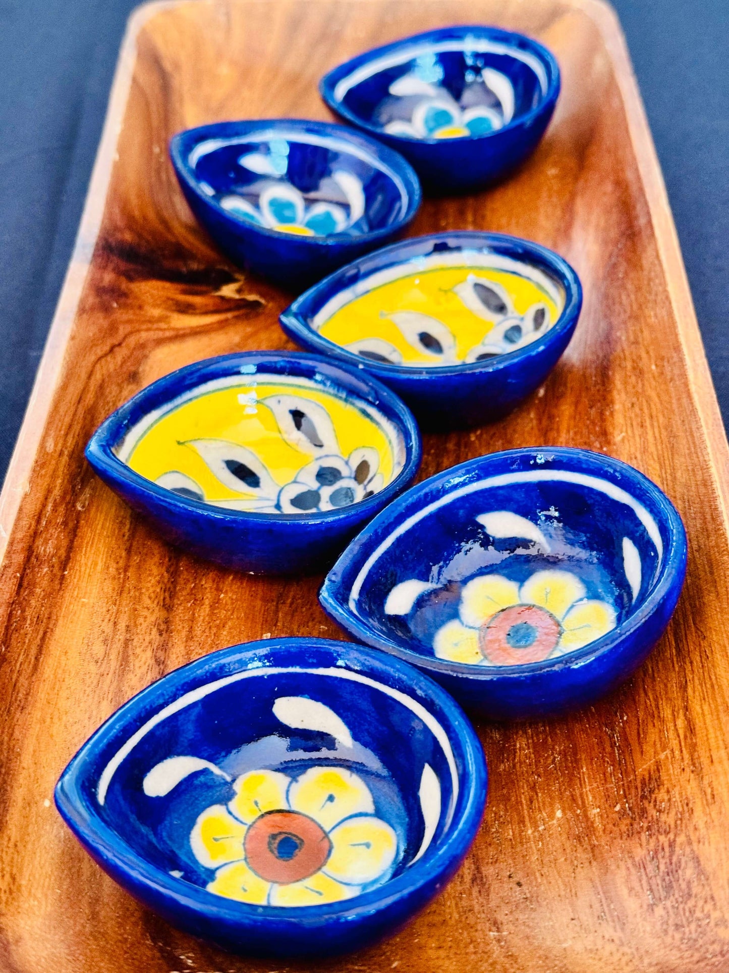 Handcrafted Jaipur Blue Pottery diyas, featuring intricate patterns and vibrant blue tones, perfect for adding a traditional Indian touch to your festive celebrations.