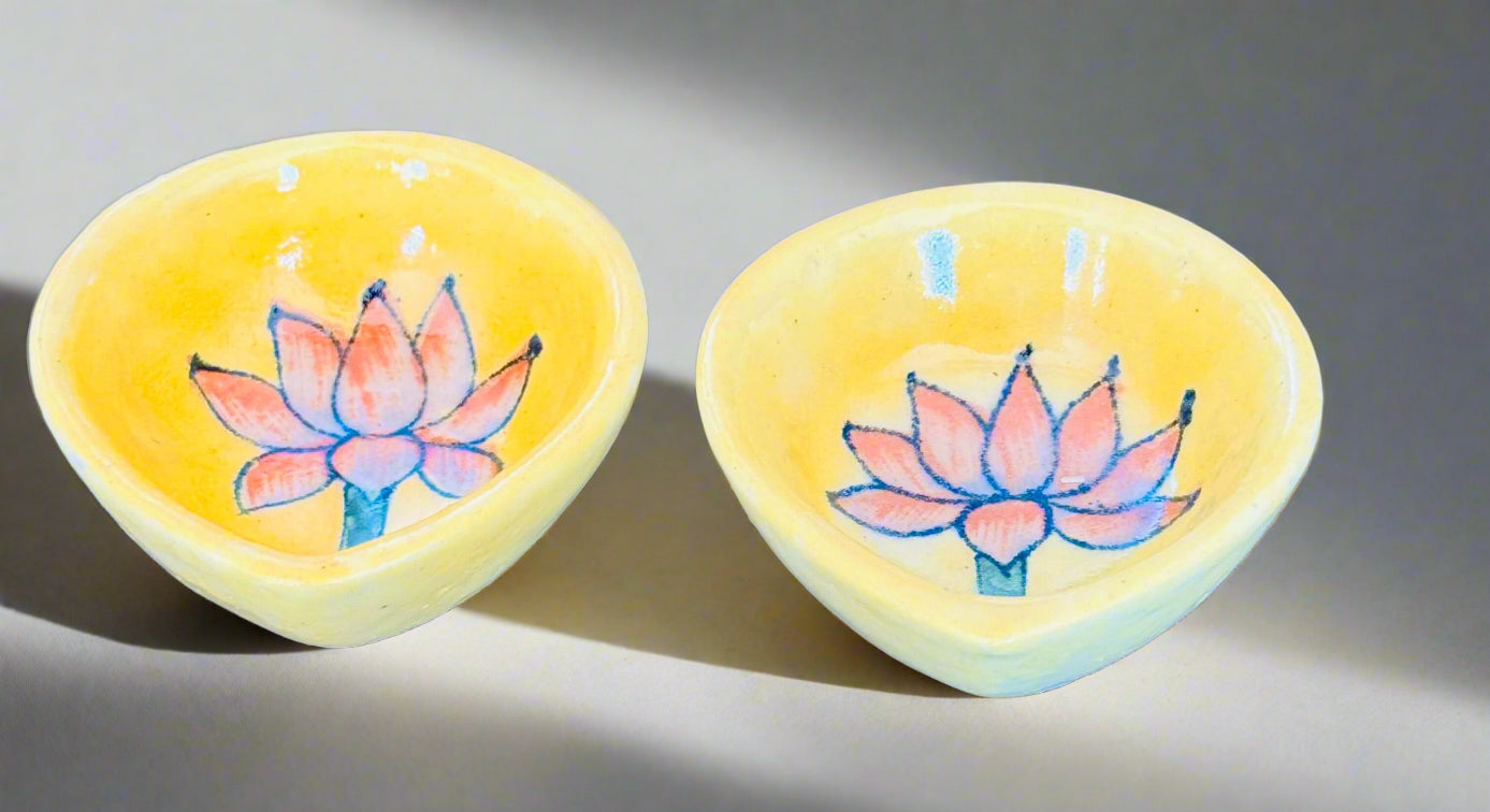Handcrafted Jaipur Blue Pottery diyas, featuring intricate patterns and vibrant blue tones, perfect for adding a traditional Indian touch to your festive celebrations.