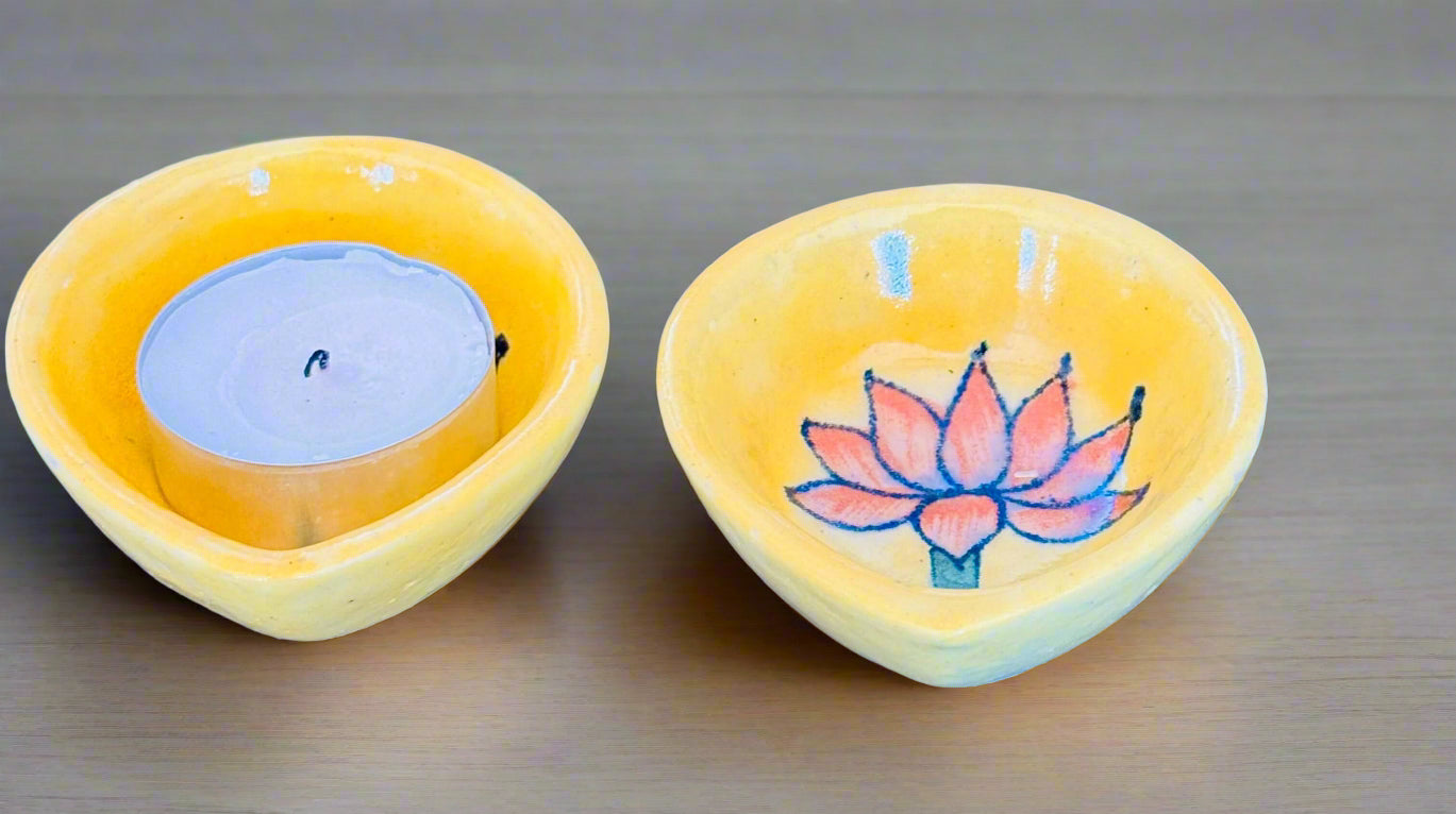 Handcrafted Jaipur Blue Pottery diyas, featuring intricate patterns and vibrant blue tones, perfect for adding a traditional Indian touch to your festive celebrations.