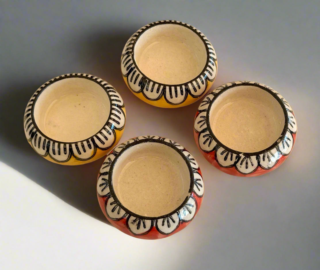 Handcrafted Jaipur Blue Pottery tea light holders, featuring intricate designs and vibrant blue hues, adding a traditional Indian touch to your home decor.