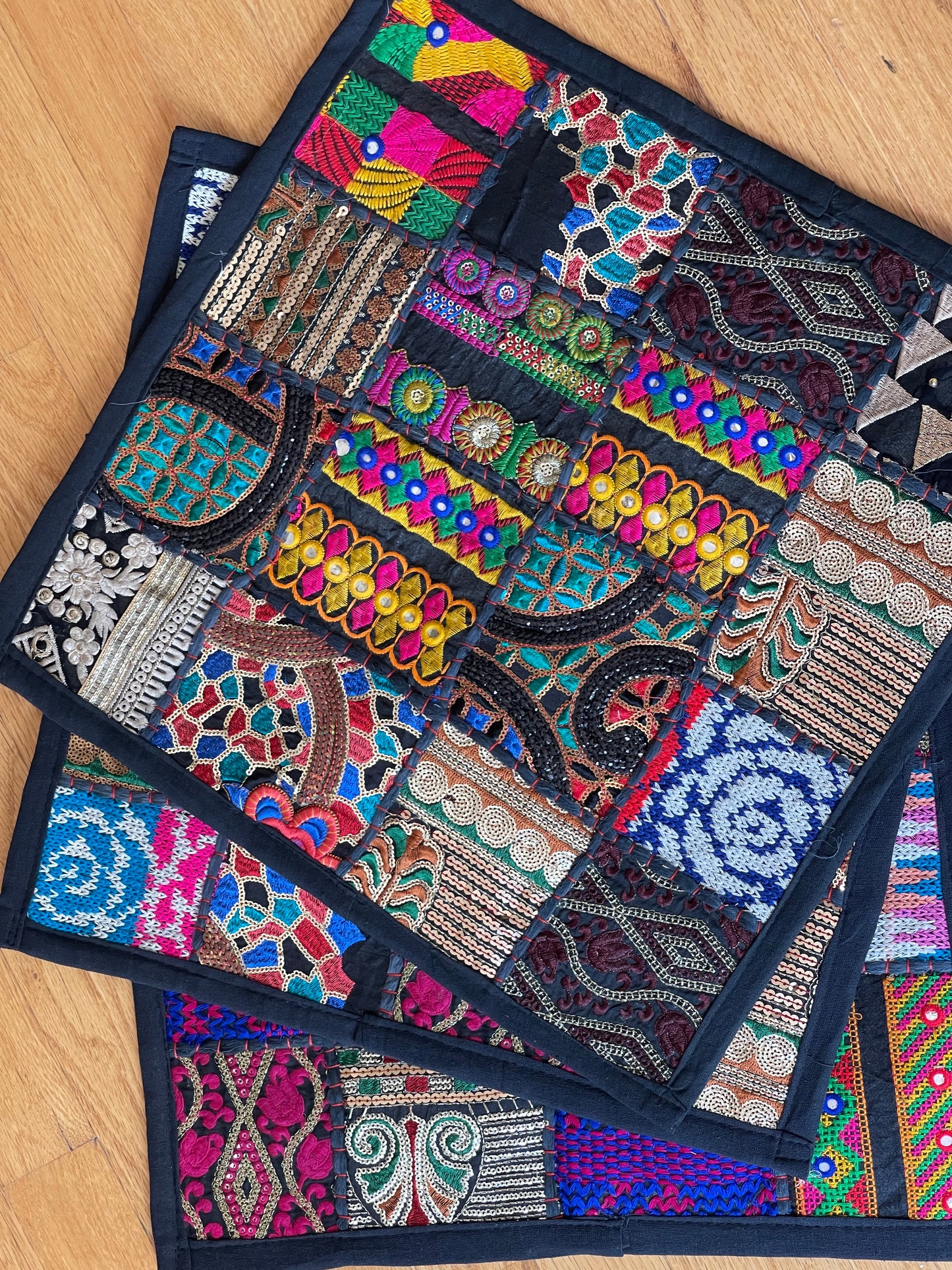 Handcrafted Kutchi Khambhadia work cushion covers, featuring vibrant patchwork and intricate embroidery, adding a touch of traditional Indian craftsmanship to your home decor.
