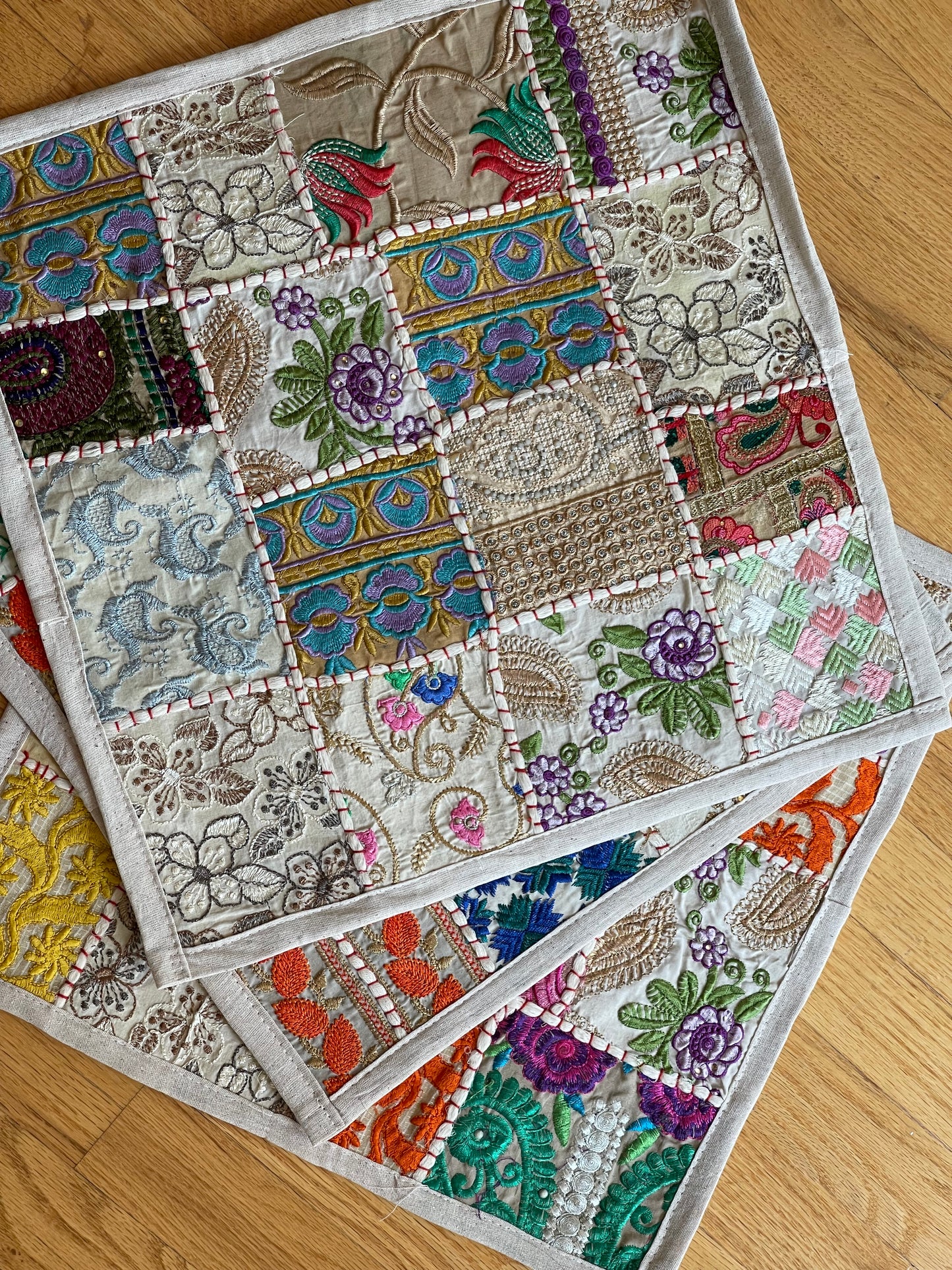 Handcrafted Kutchi Khambhadia work cushion covers, featuring vibrant patchwork and intricate embroidery, adding a touch of traditional Indian craftsmanship to your home decor.