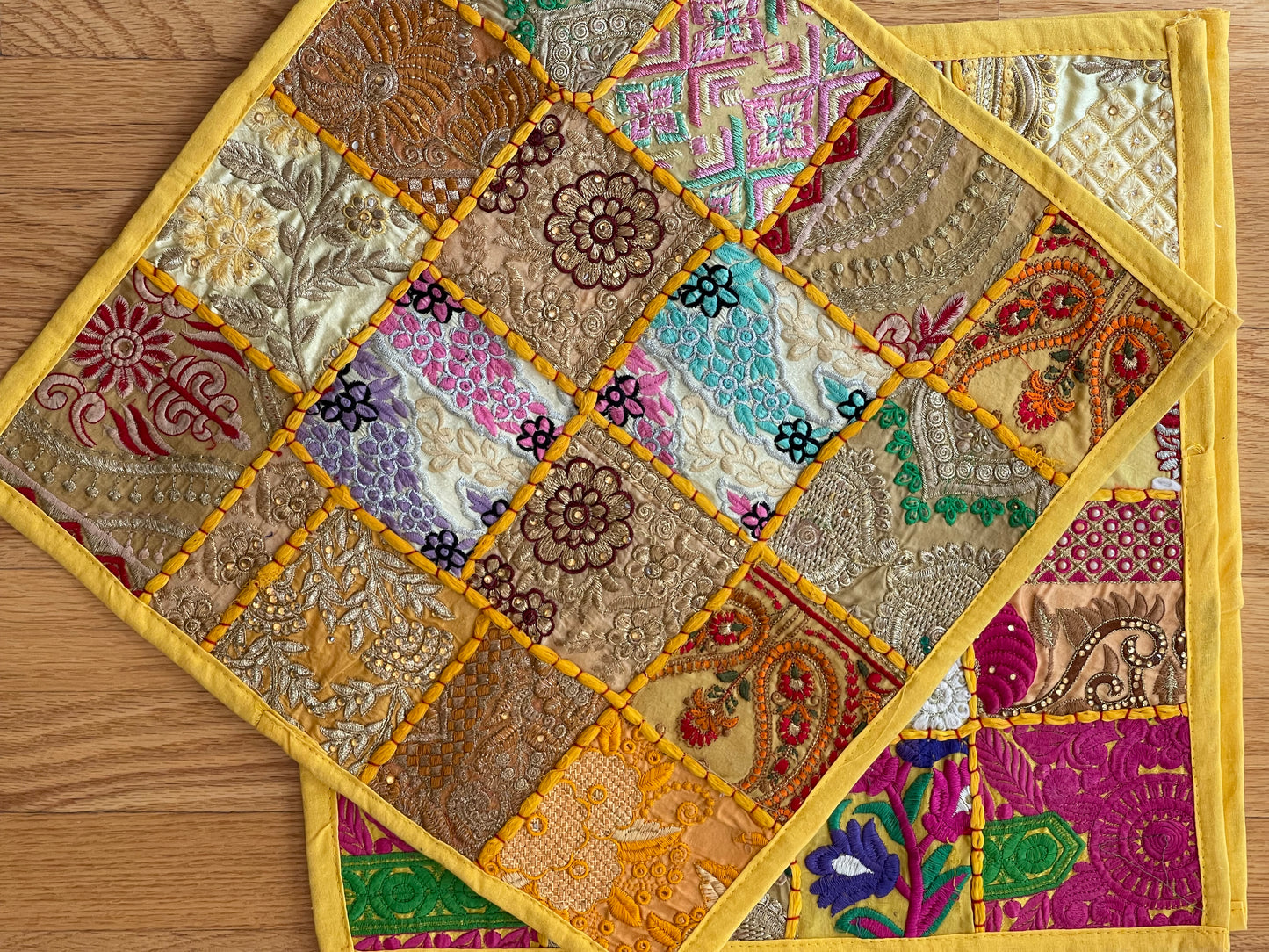 Handcrafted Kutchi Khambhadia work cushion covers, featuring vibrant patchwork and intricate embroidery, adding a touch of traditional Indian craftsmanship to your home decor.