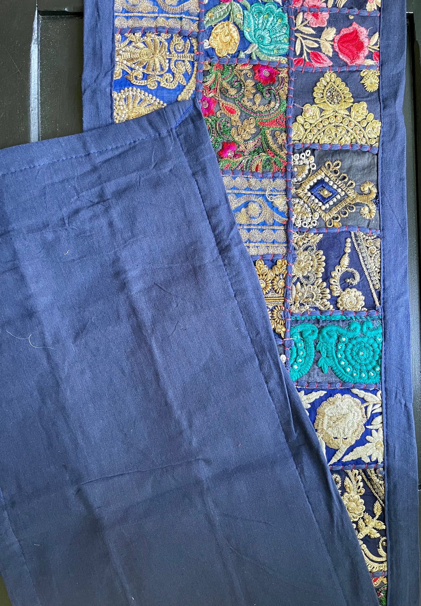 Handwoven Kutchi Khambhadia work table runners, featuring vibrant patchwork and intricate embroidery, adding a touch of traditional Indian craftsmanship to your table.