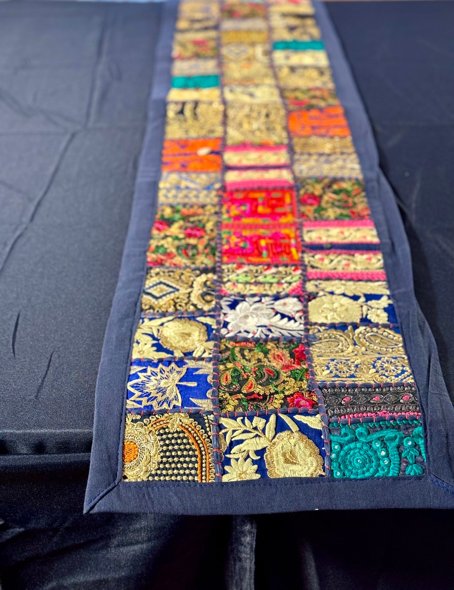 Handwoven Kutchi Khambhadia work table runners, featuring vibrant patchwork and intricate embroidery, adding a touch of traditional Indian craftsmanship to your table.