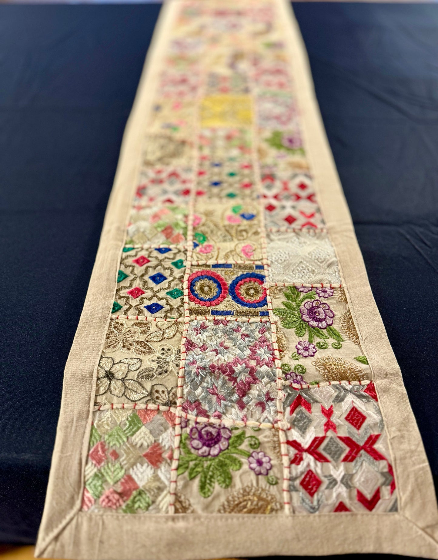 Handwoven Kutchi Khambhadia work table runners, featuring vibrant patchwork and intricate embroidery, adding a touch of traditional Indian craftsmanship to your table.