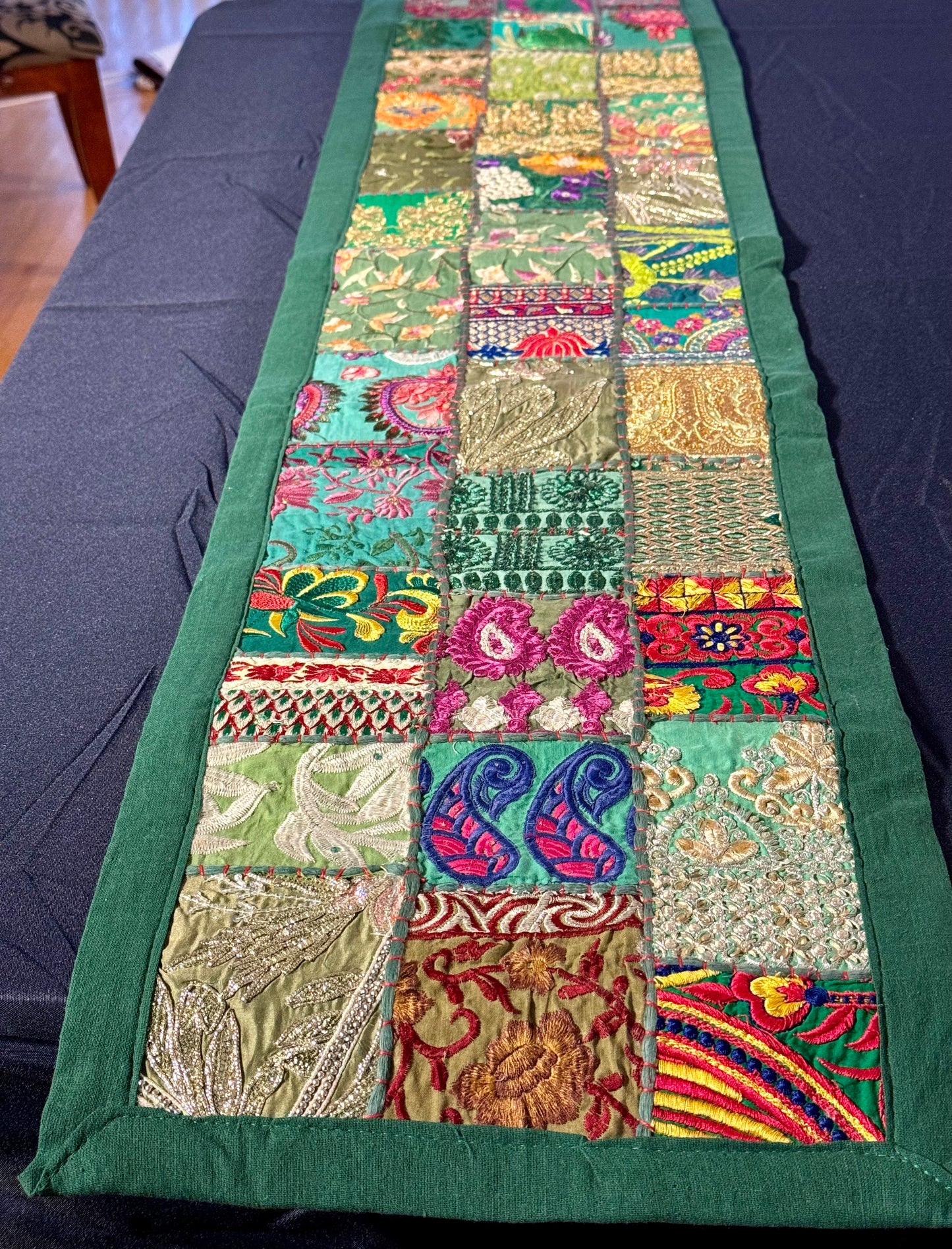 Handwoven Kutchi Khambhadia work table runners, featuring vibrant patchwork and intricate embroidery, adding a touch of traditional Indian craftsmanship to your table.