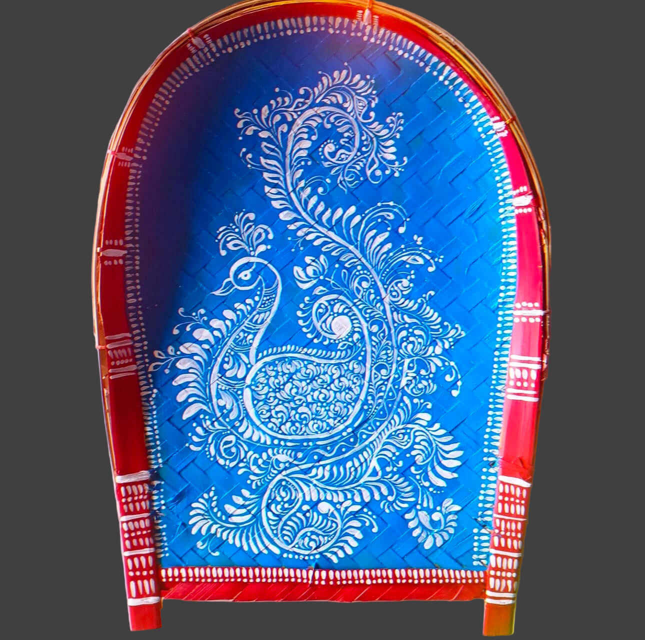 Hand-painted Alpona art on Kulo baskets, featuring intricate Bengali motifs in traditional, flowing patterns.