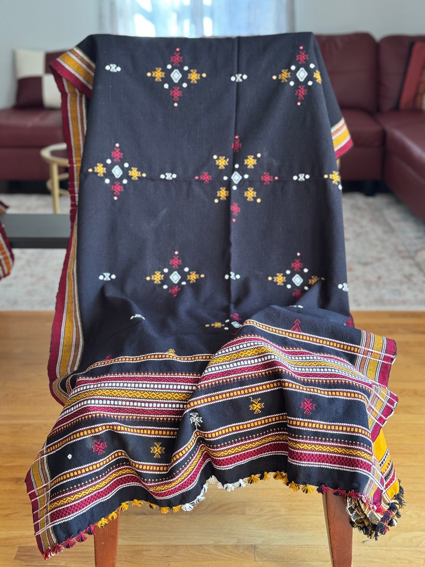 Handcrafted Kutchi embroidery pure sheep wool shawls, featuring intricate traditional patterns and vibrant threads, offering warmth and elegance with a cultural touch.