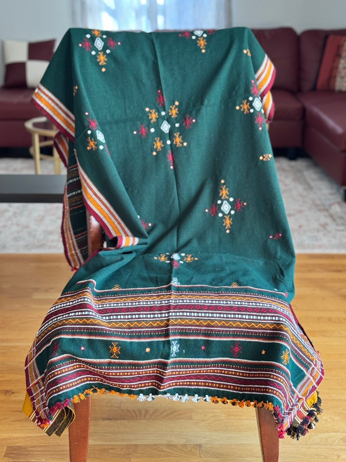Handcrafted Kutchi embroidery pure sheep wool shawls, featuring intricate traditional patterns and vibrant threads, offering warmth and elegance with a cultural touch.